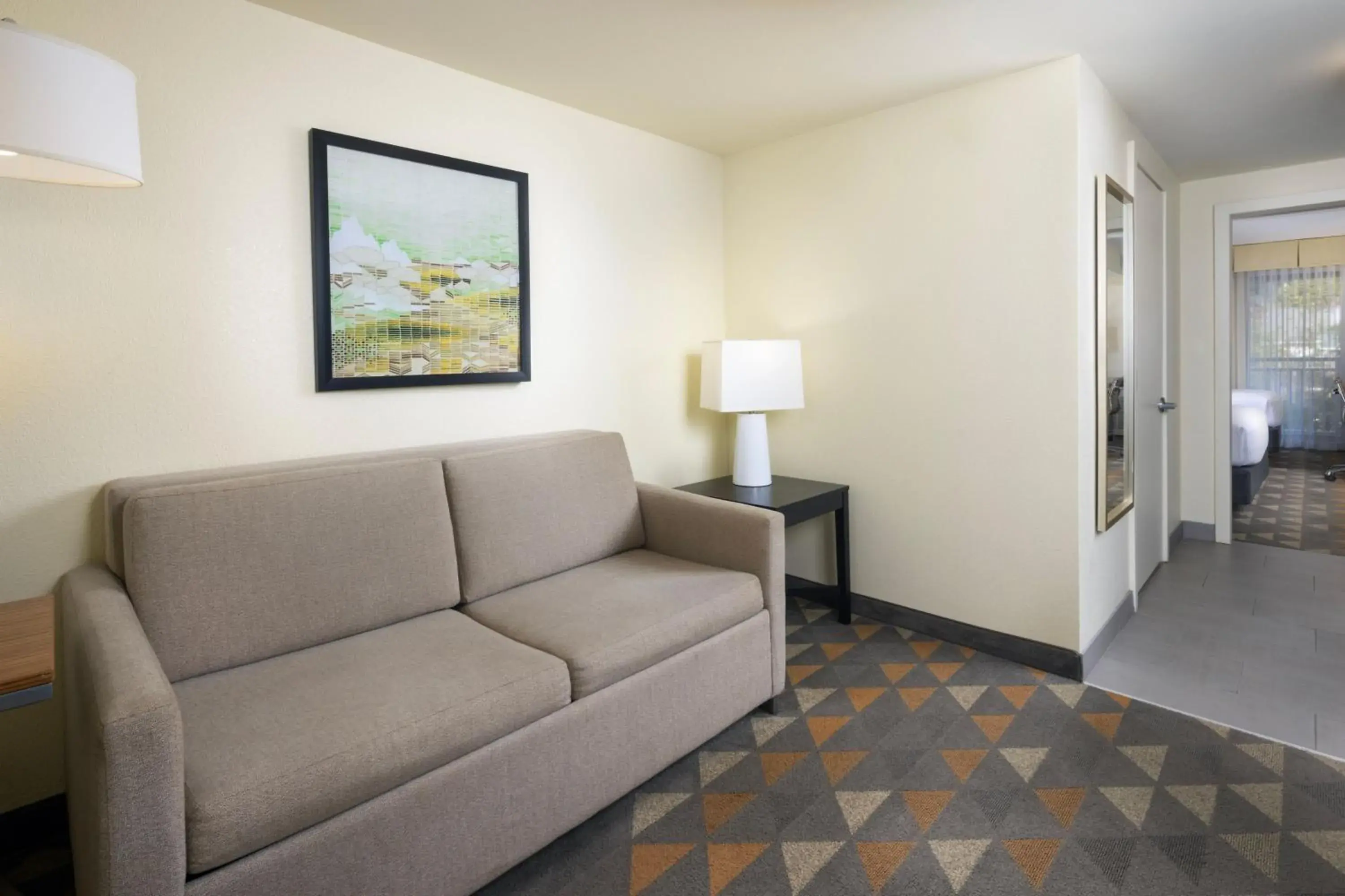 Photo of the whole room, Seating Area in Holiday Inn & Suites Asheville-Biltmore Vlg Area, an IHG Hotel