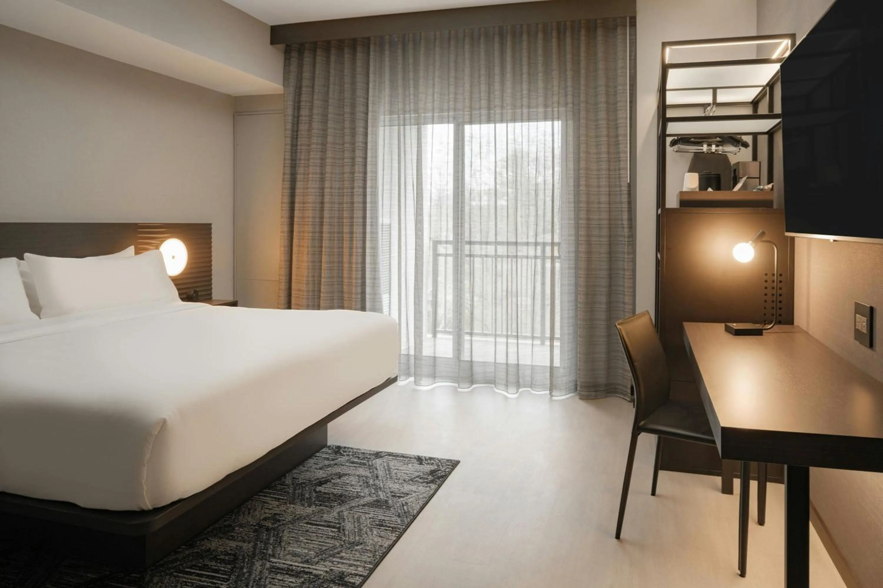 Photo of the whole room, Bed in AC Hotel Asheville Biltmore Village