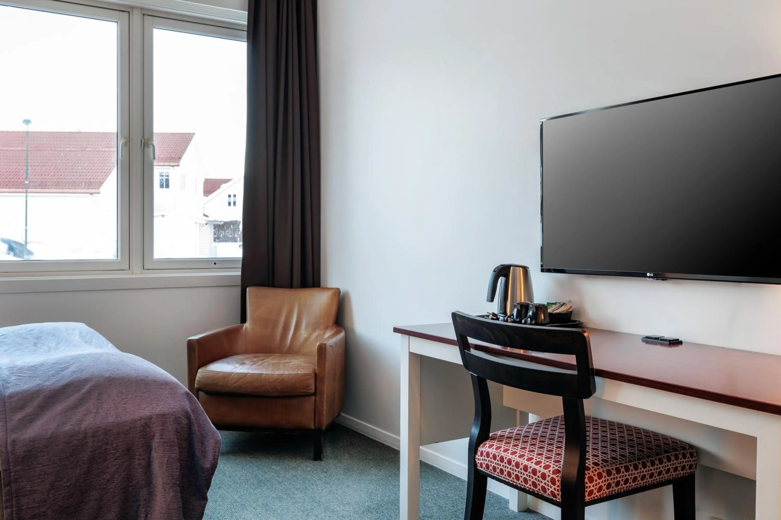 Communal lounge/ TV room in Quality Hotel Skjærgården