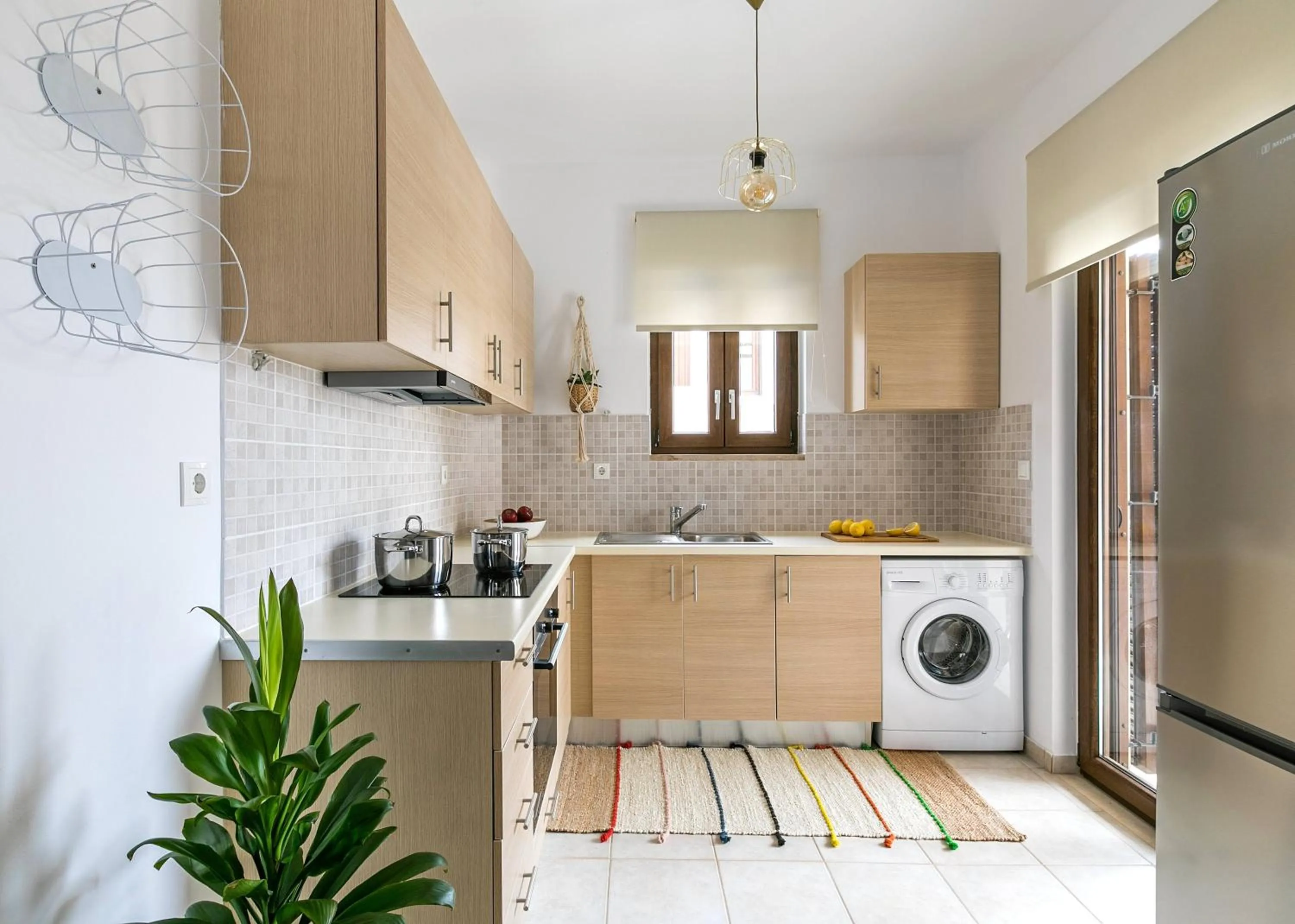 Kitchen or kitchenette in Syra Suites