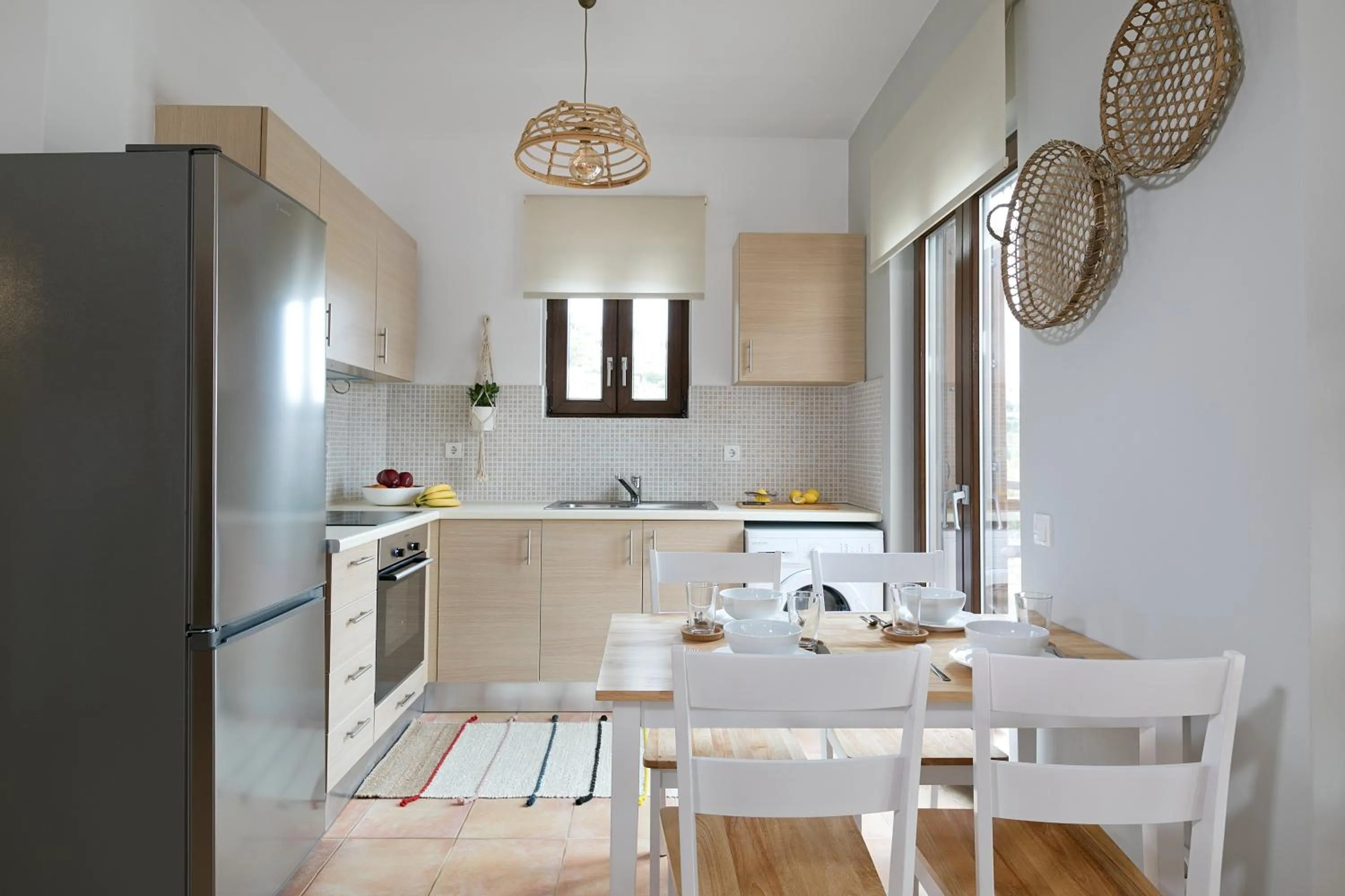 Kitchen or kitchenette in Syra Suites