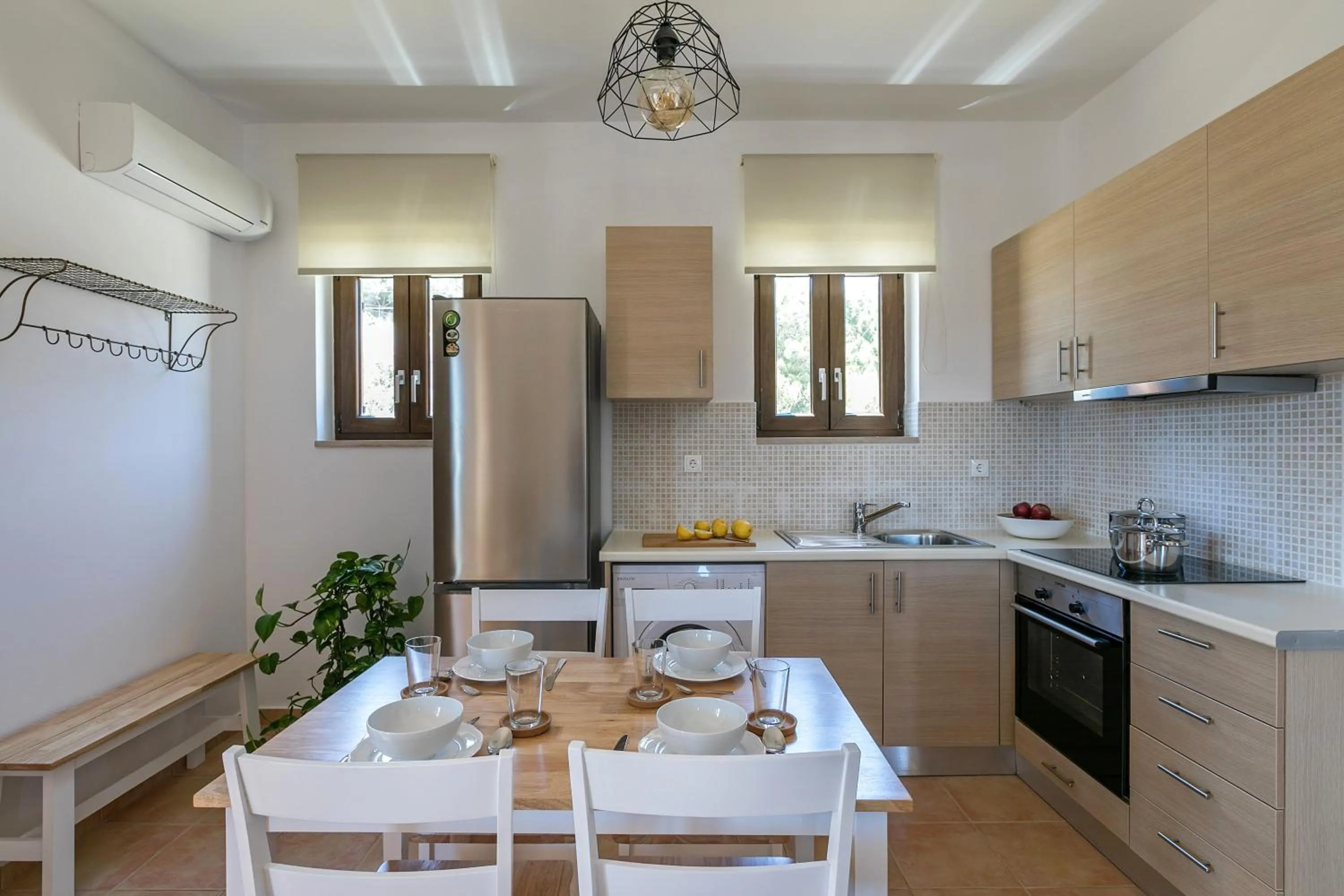 Kitchen or kitchenette in Syra Suites