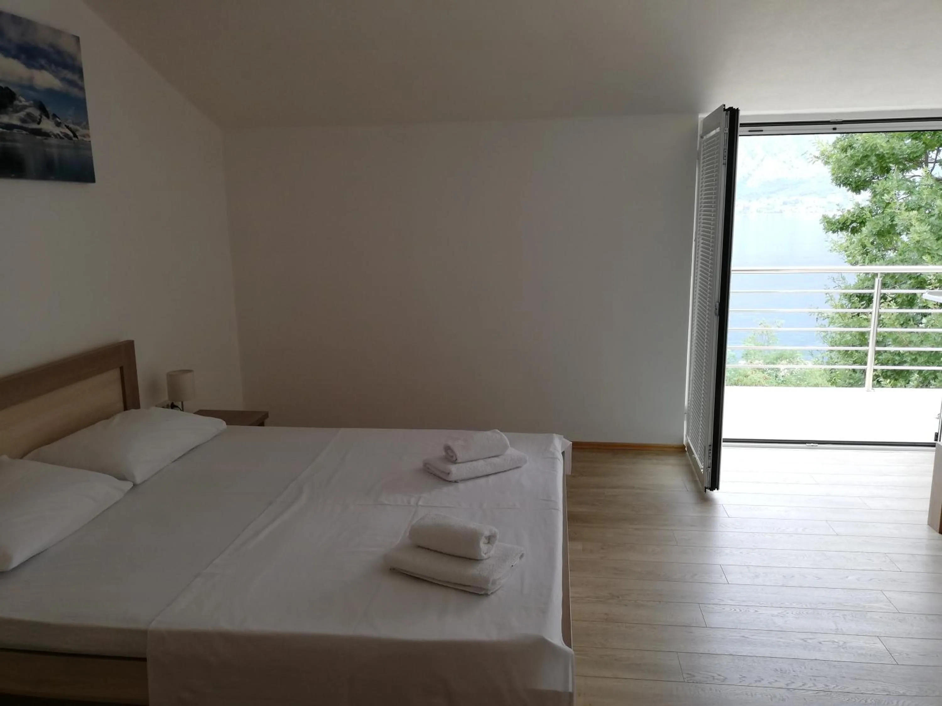 Bed in Ruža Apartments Sea View