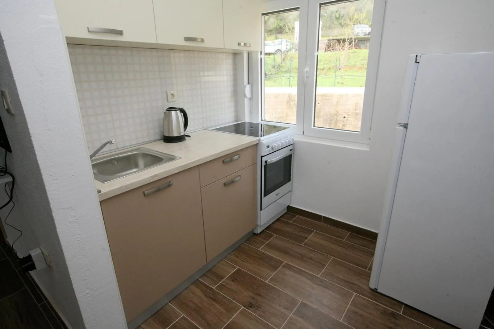 Communal kitchen in Ruža Apartments Sea View