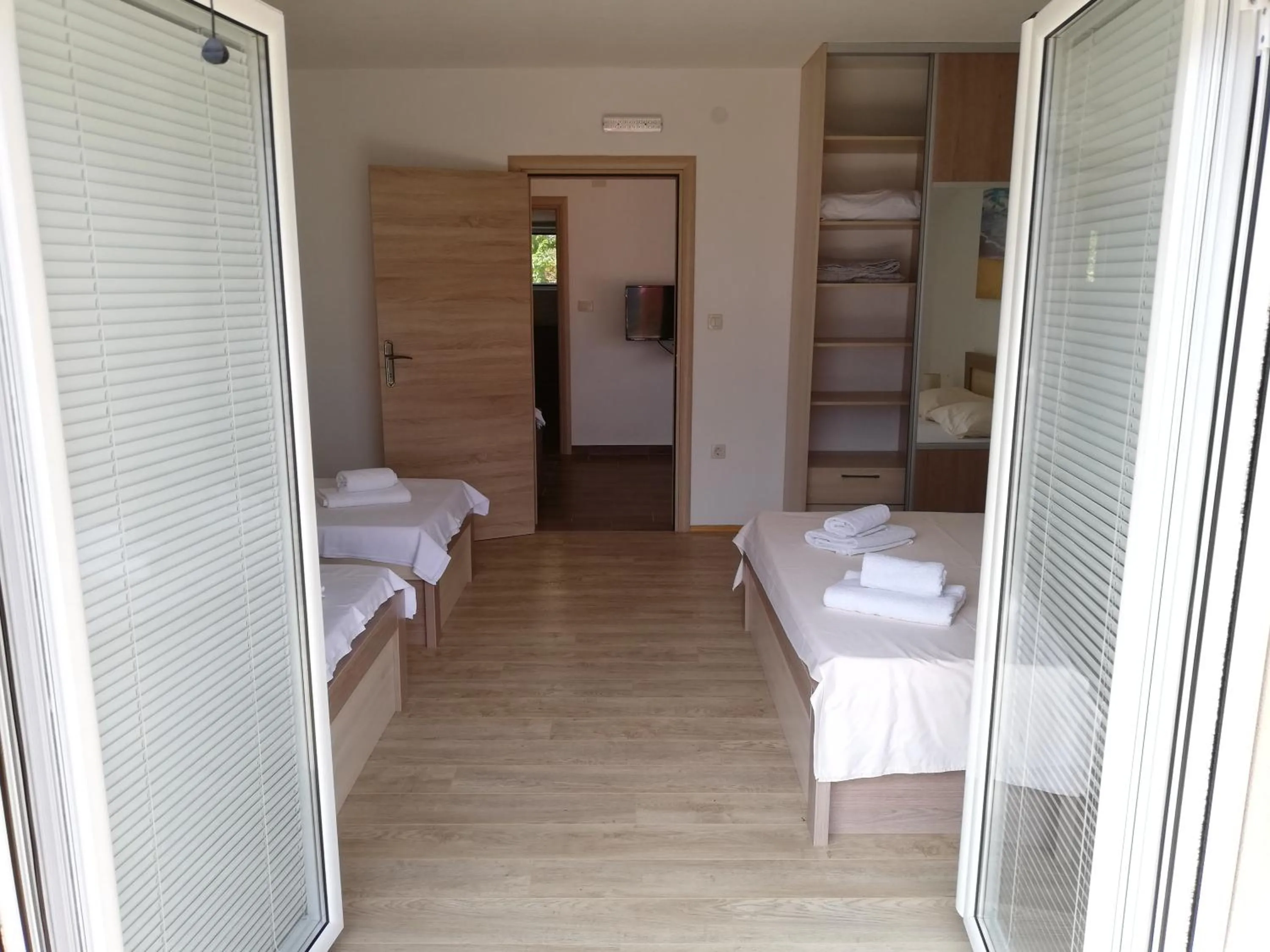 Bed in Ruža Apartments Sea View