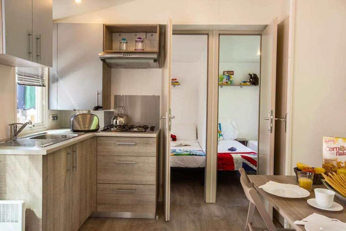 Kitchen or kitchenette in hu I Pini village