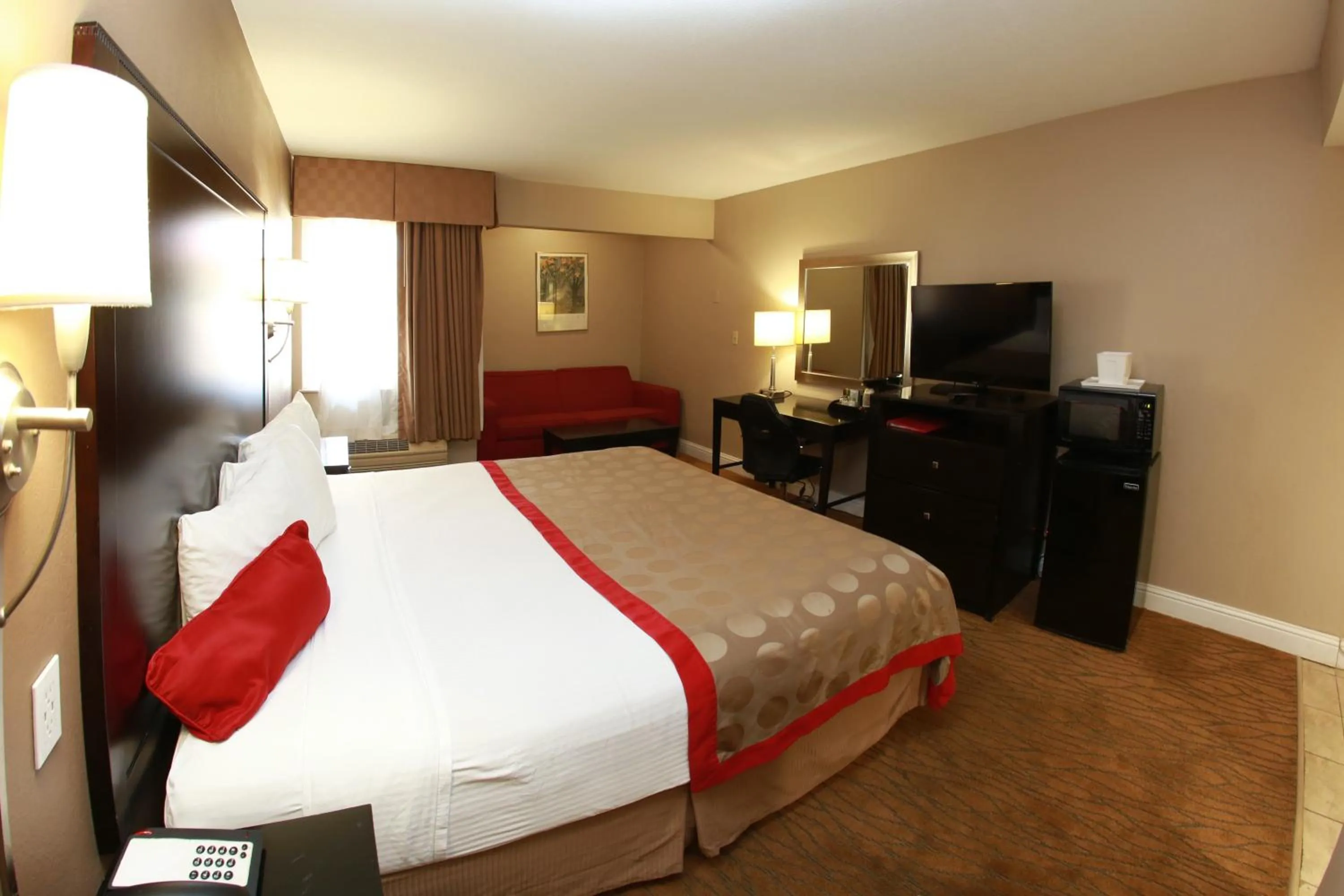 Bed in Ramada by Wyndham Fresno North