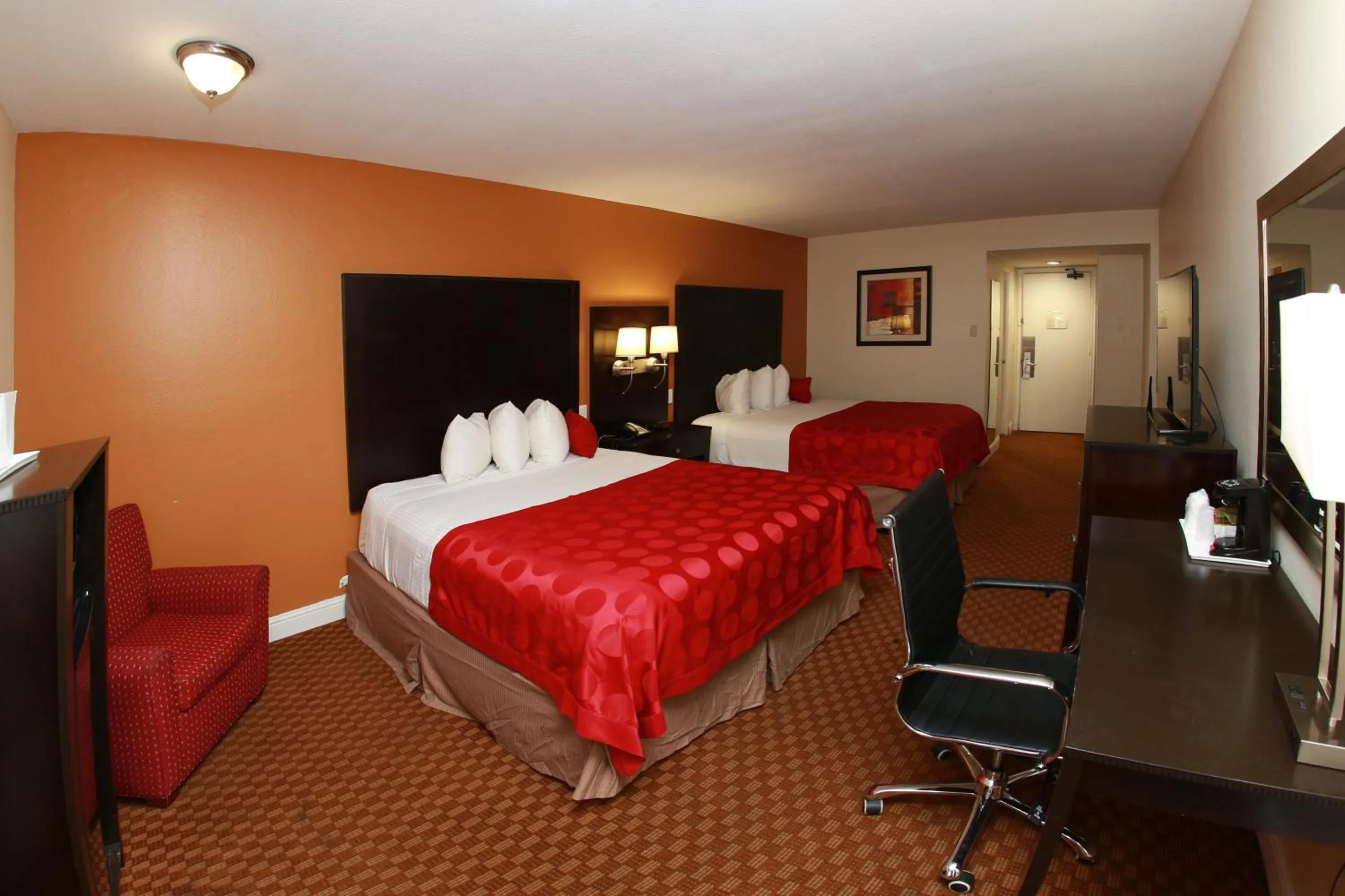 Bed in Ramada by Wyndham Fresno North
