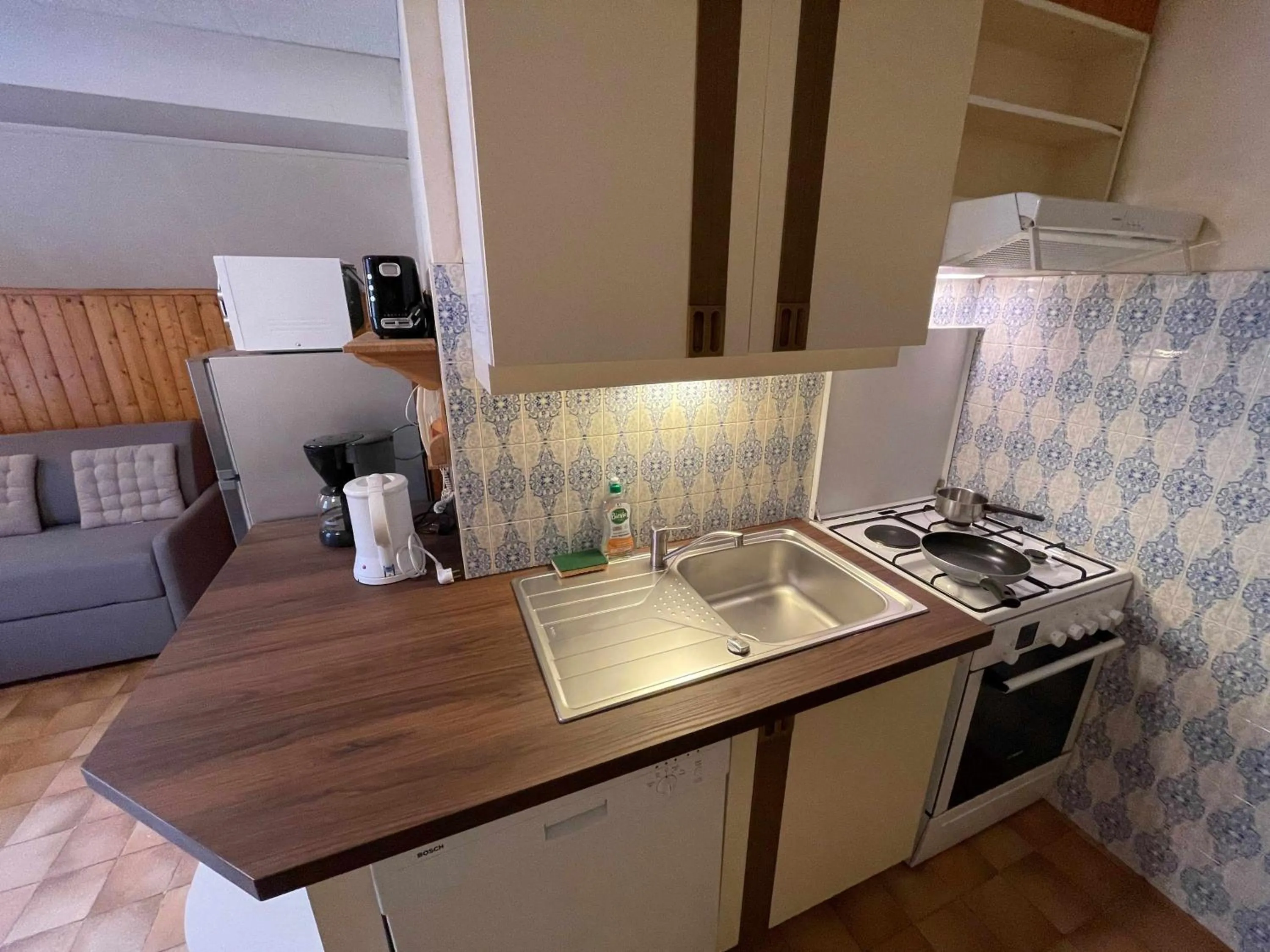 Kitchen or kitchenette in Logis Hotel & Spa Beau-Site