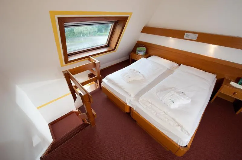 Bed in Centro Pineta Family Hotel & Wellness