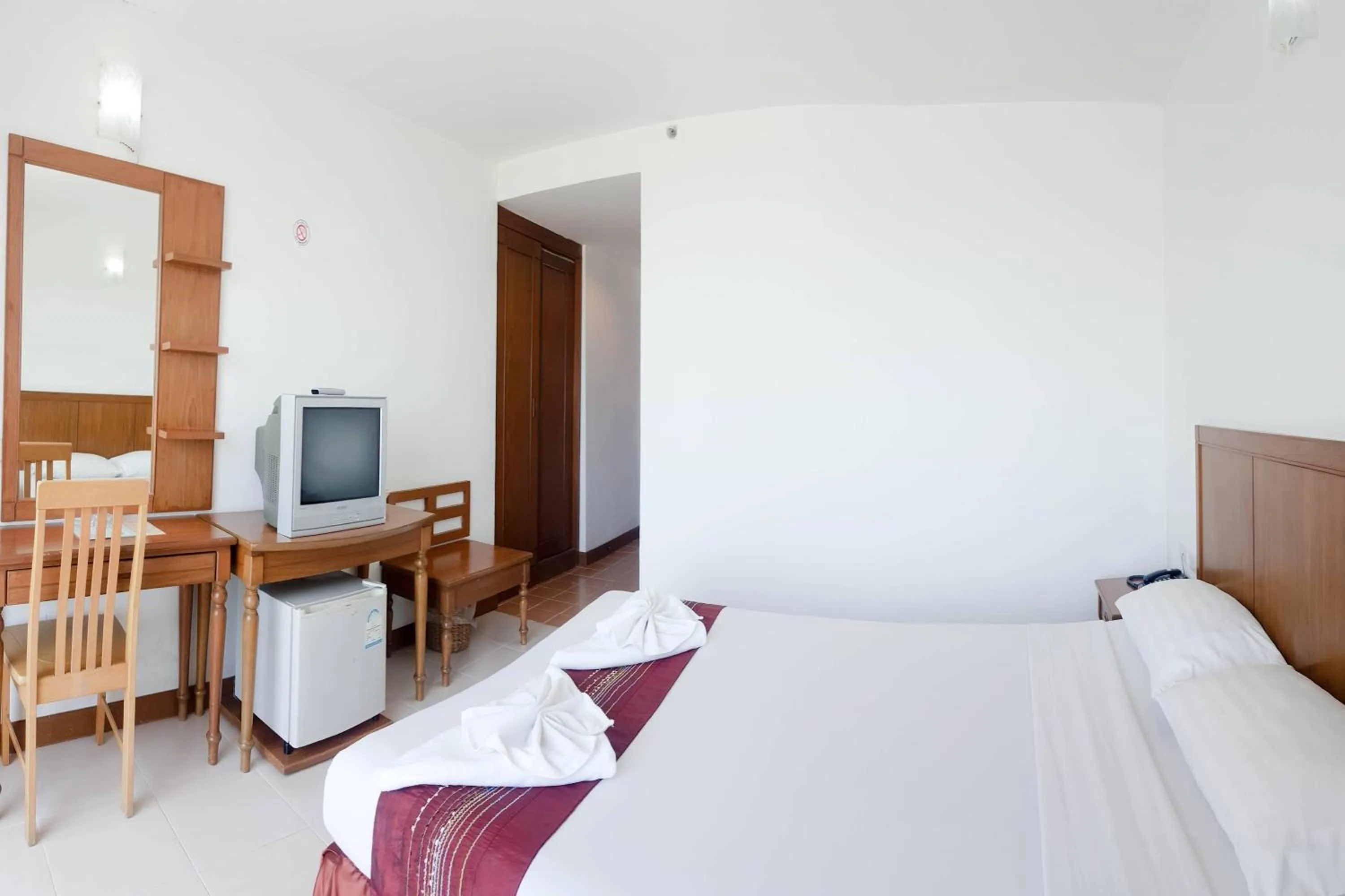 Bed in Eastiny Seven Hotel