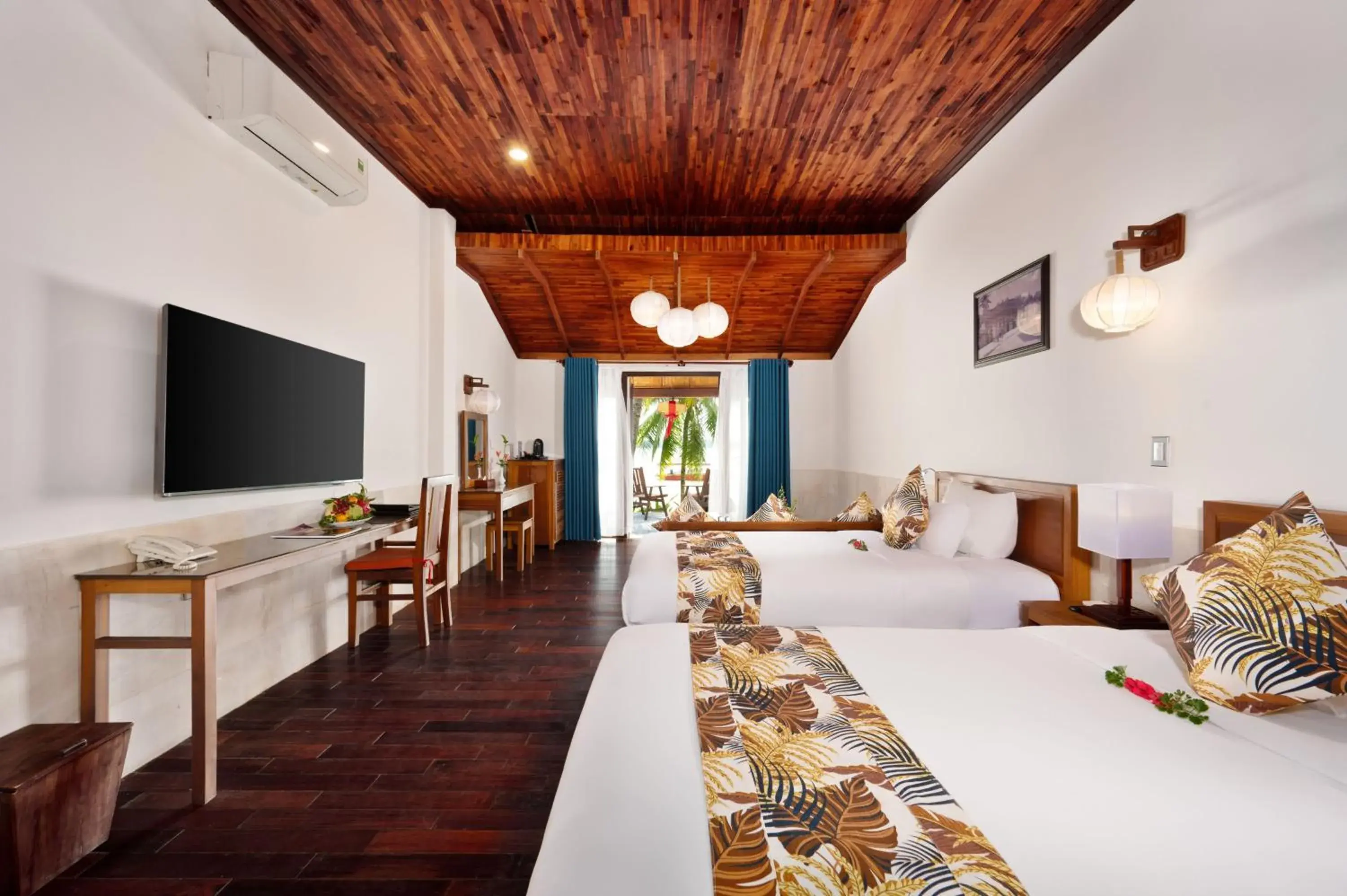 Bed in Vinh Hung Riverside Resort & Spa Bed in Vinh Hung Riverside Resort & Spa