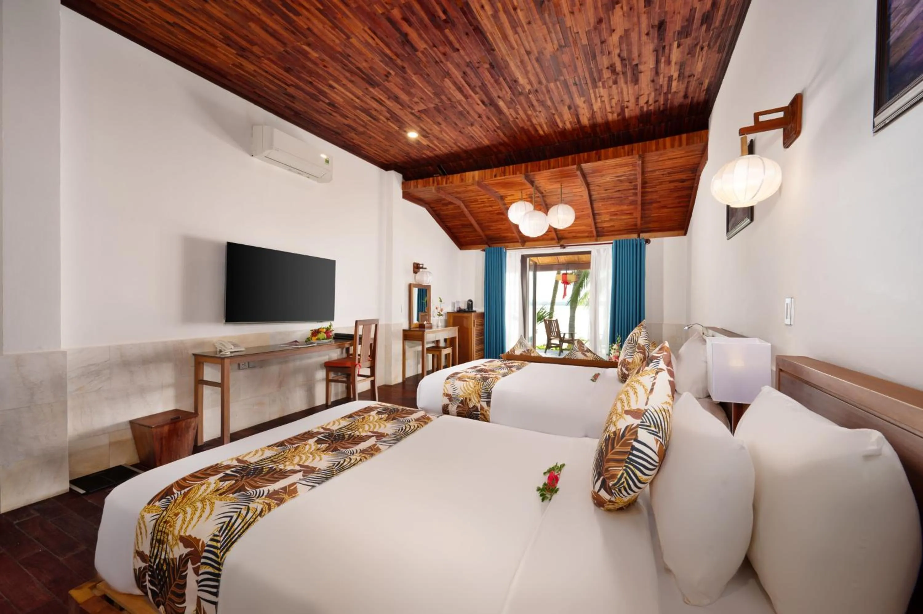 Bed in Vinh Hung Riverside Resort & Spa