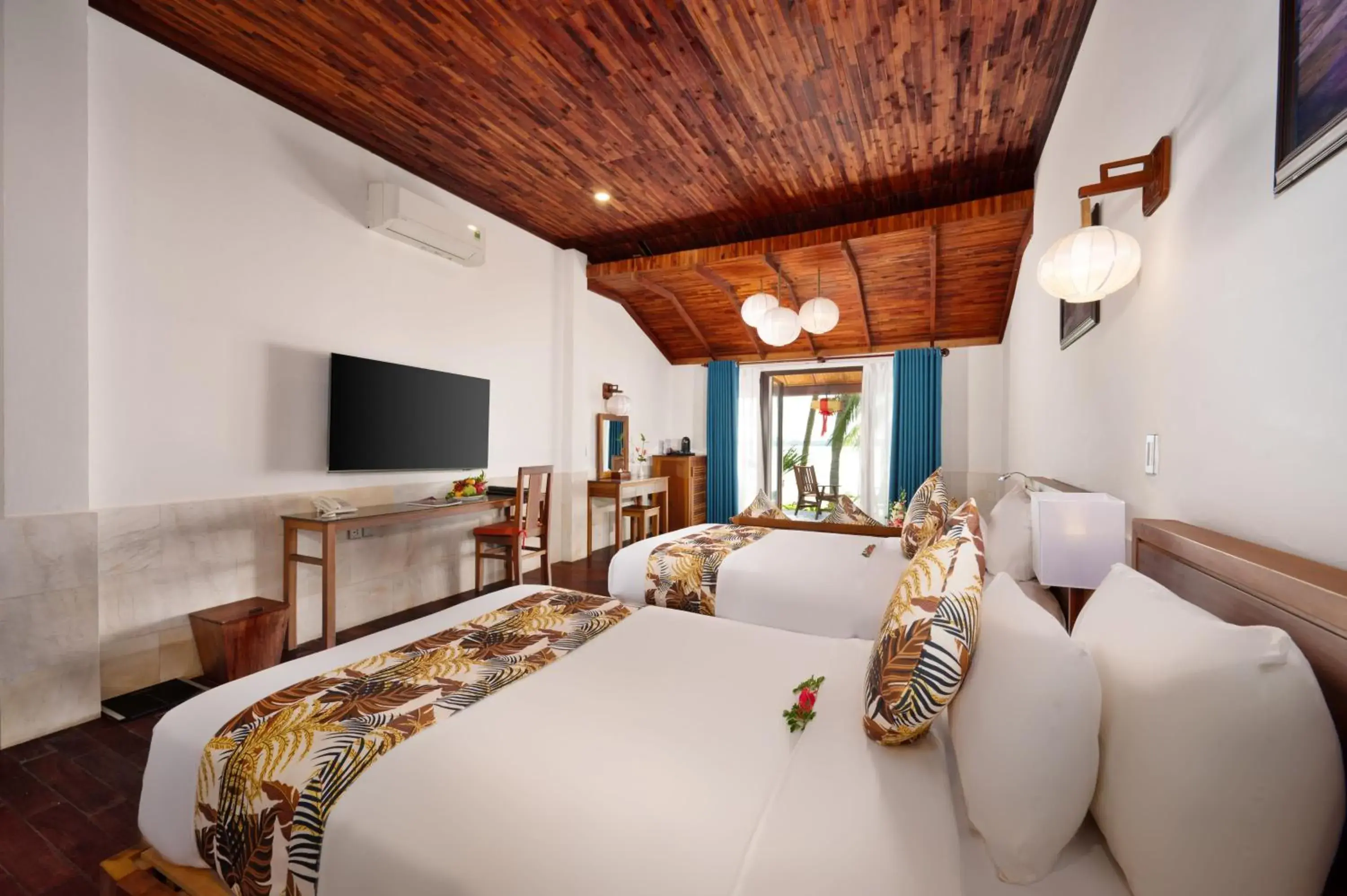 Bed in Vinh Hung Riverside Resort & Spa Bed in Vinh Hung Riverside Resort & Spa