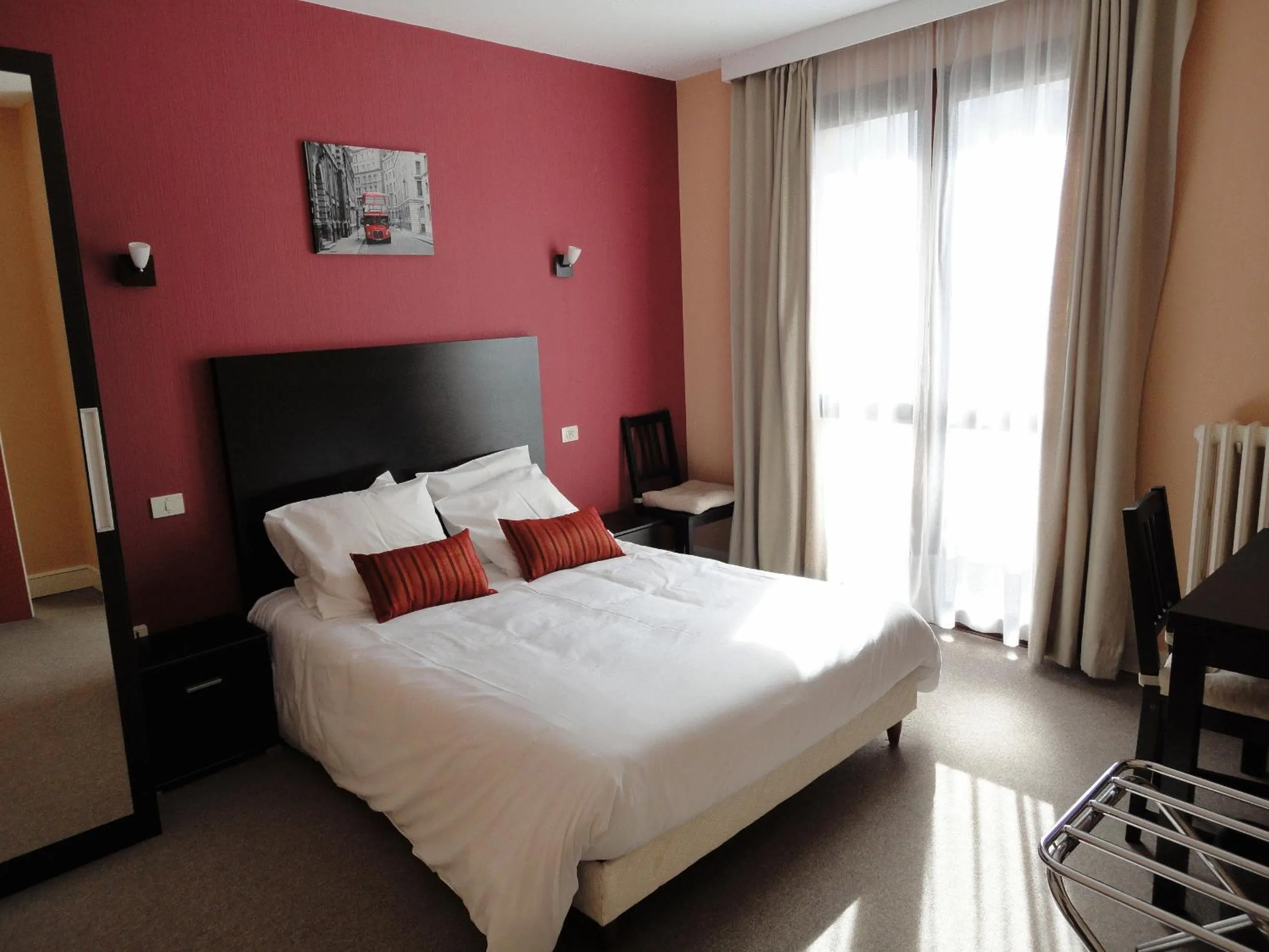 Photo of the whole room, Bed in Logis Hôtel AMBROISE