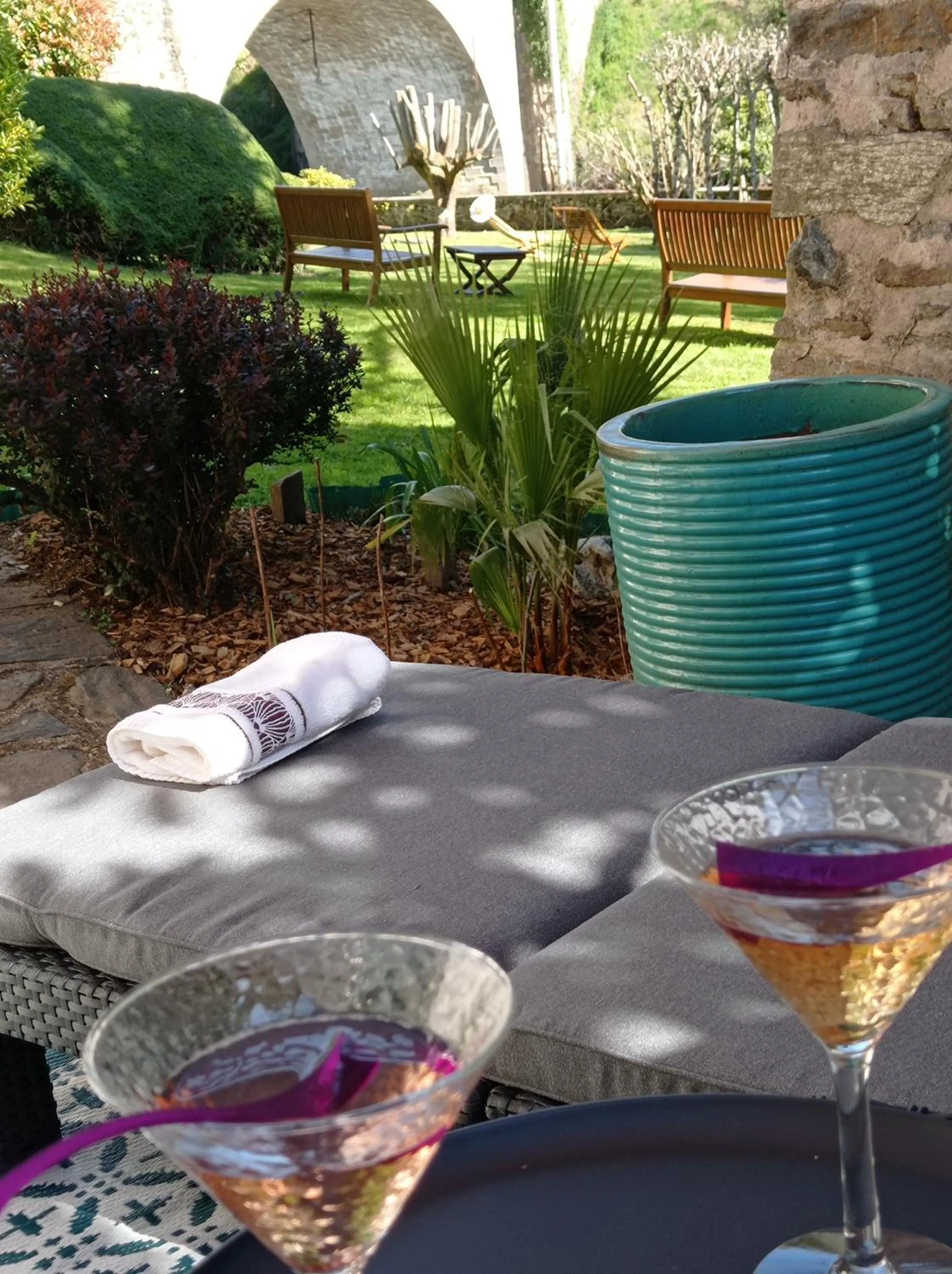 Garden view in Logis Hôtel AMBROISE