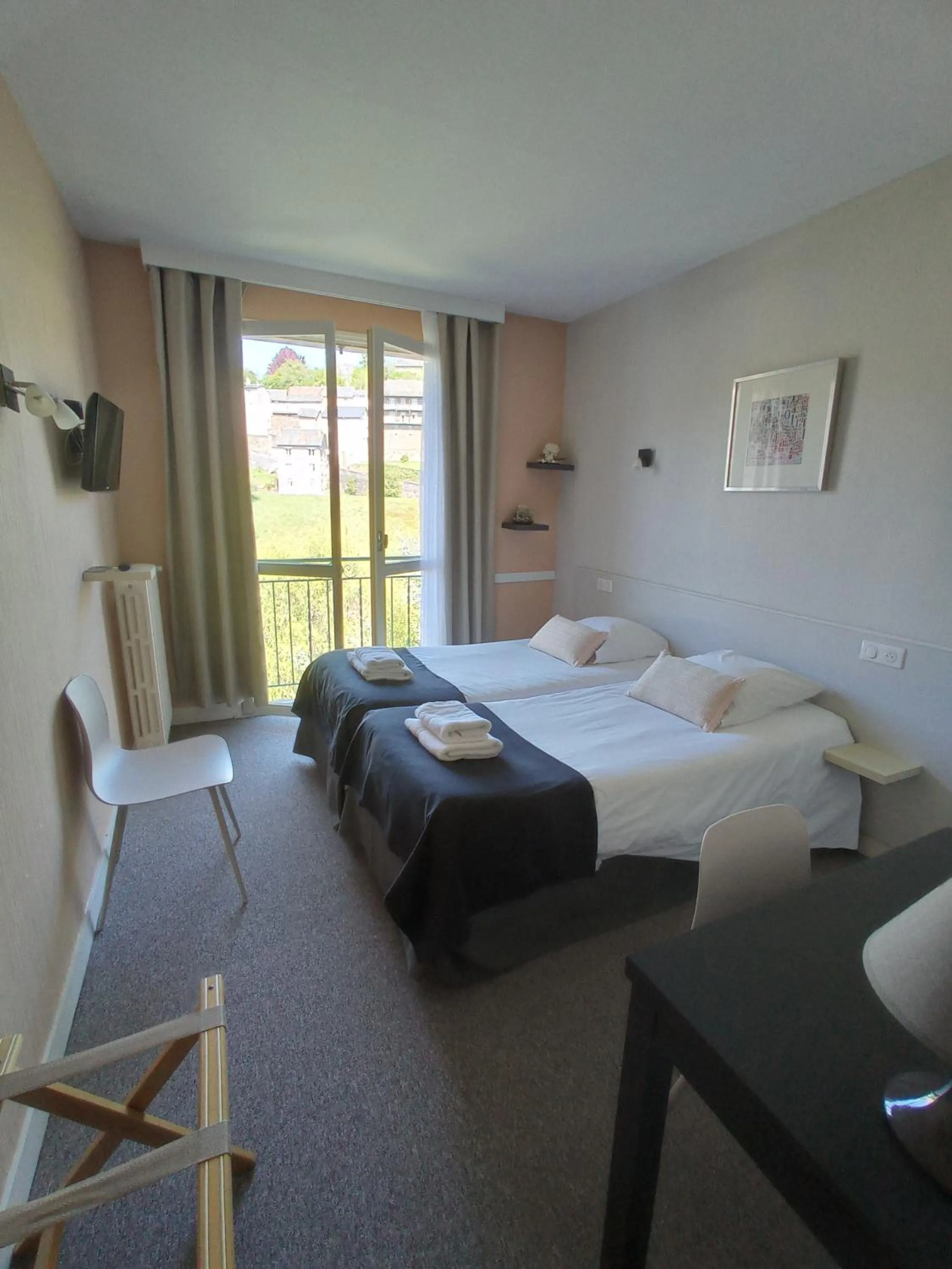 Photo of the whole room, Bed in Logis Hôtel AMBROISE