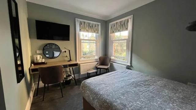 Bedroom, Bed in Charlotte Guest House