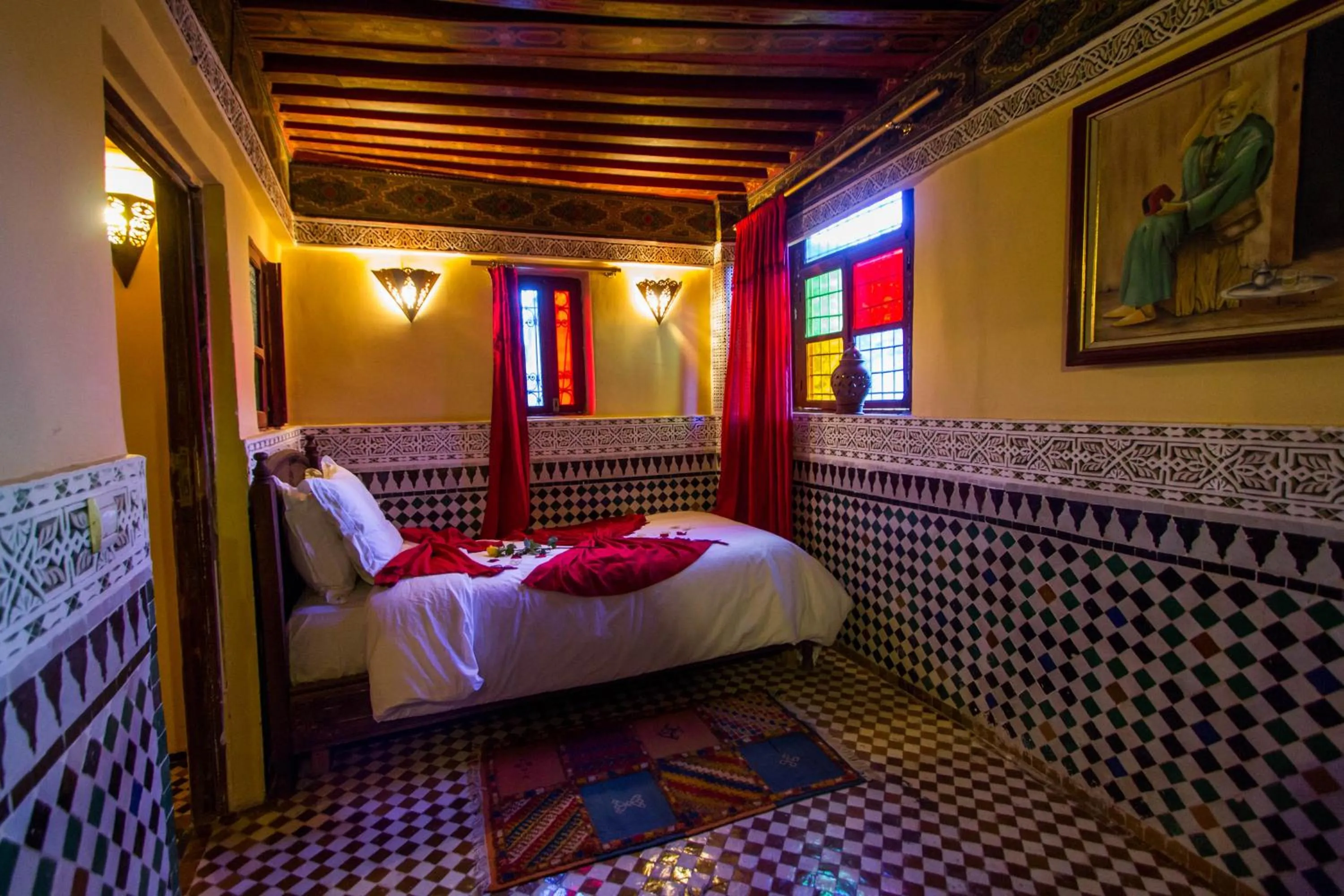 Seating area, Bed in Riad Ibn Khaldoun