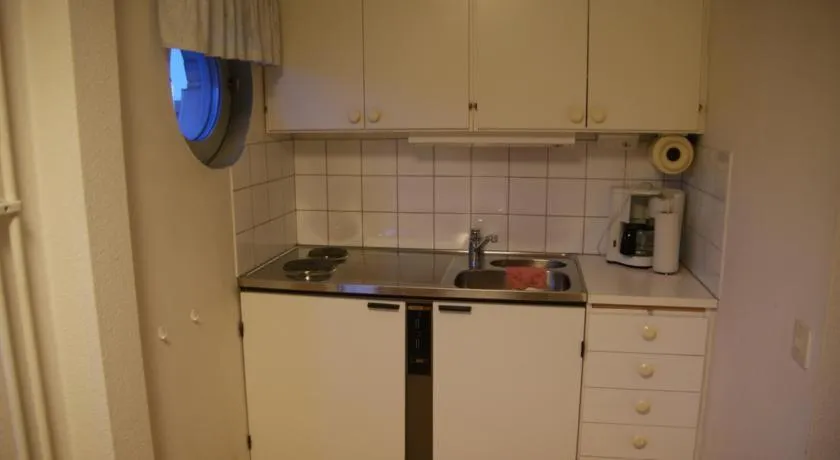 Kitchen or kitchenette in Wellingehus Hotel