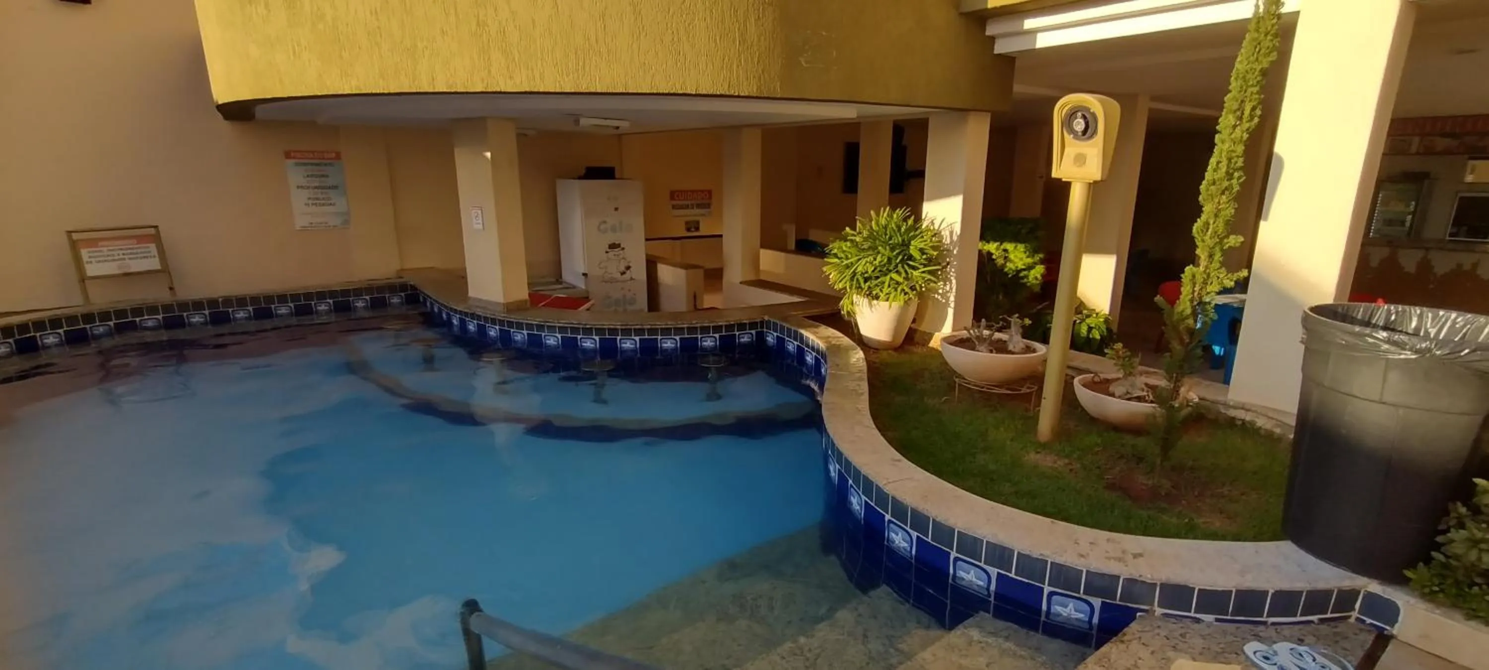 Swimming pool in Prive das Thermas I Caldas Novas - ACHEI FERIAS - com roupa de cama