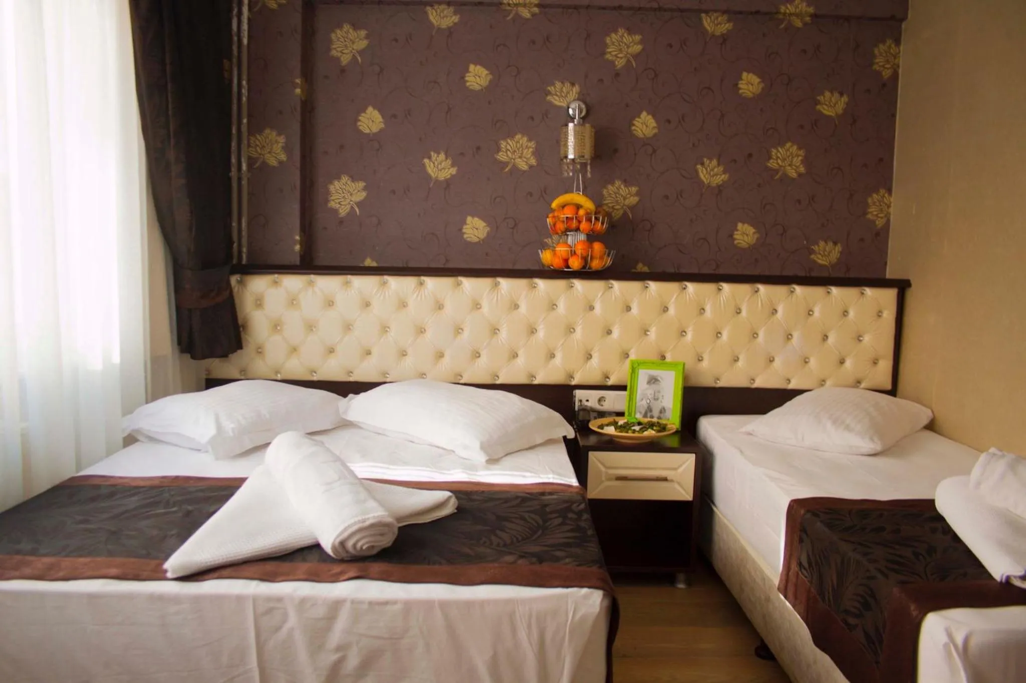 Bed in Grand Esen Hotel