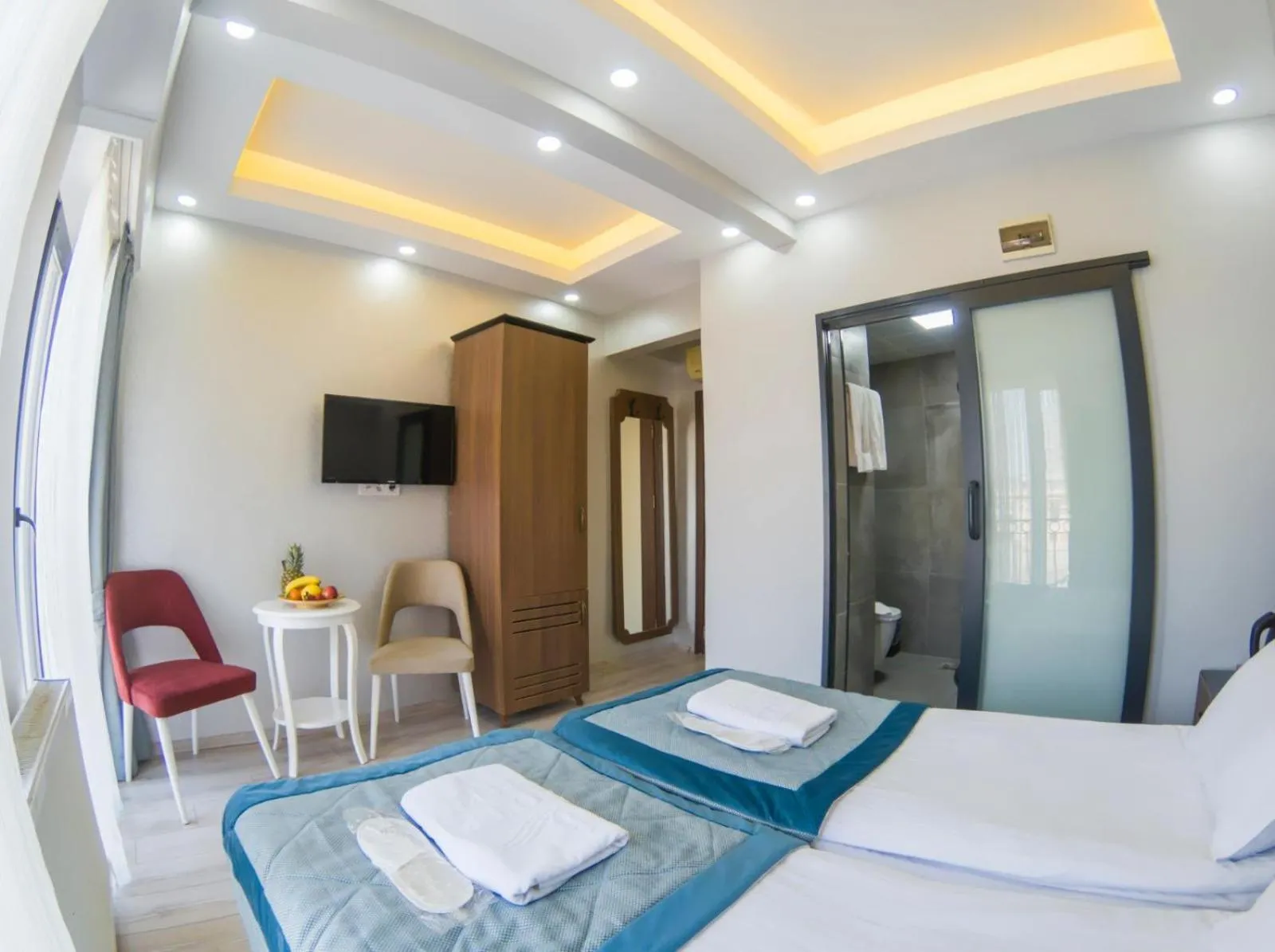 Bed in Grand Esen Hotel