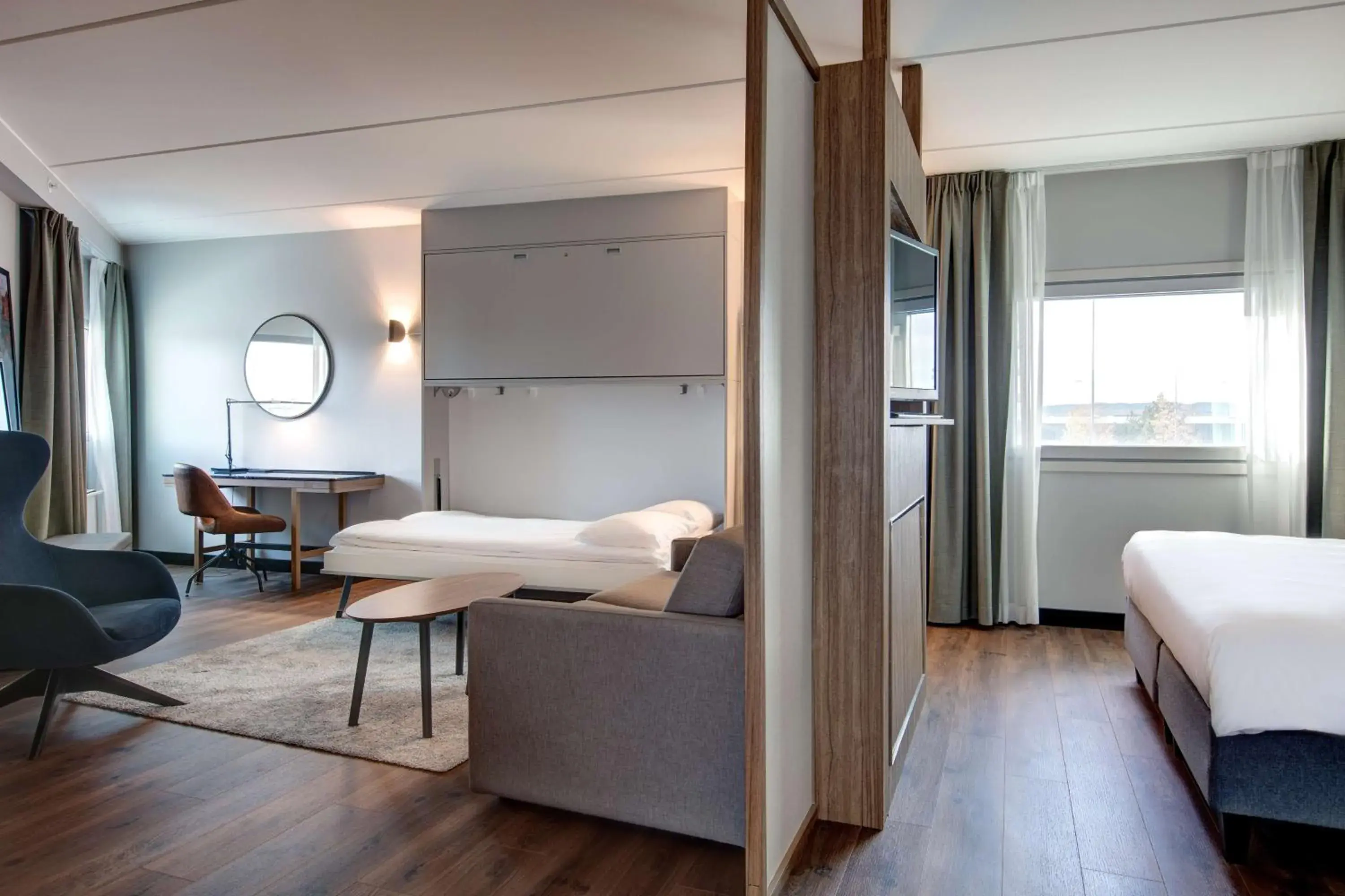 Photo of the whole room, Bed in Radisson Blu Airport Hotel, Oslo Gardermoen Photo of the whole room, Bed in Radisson Blu Airport Hotel, Oslo Gardermoen