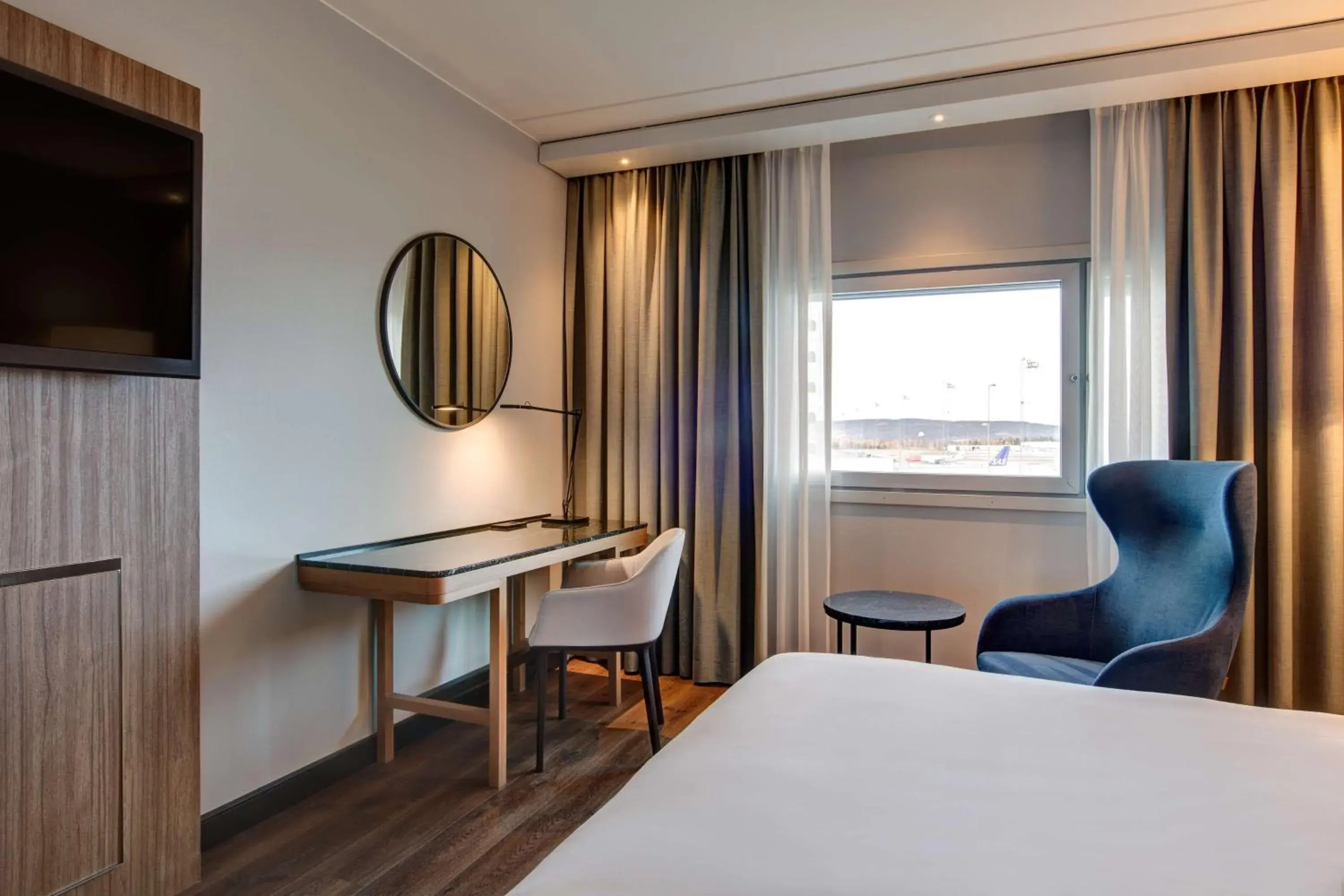 Photo of the whole room, Bed in Radisson Blu Airport Hotel, Oslo Gardermoen Photo of the whole room, Bed in Radisson Blu Airport Hotel, Oslo Gardermoen