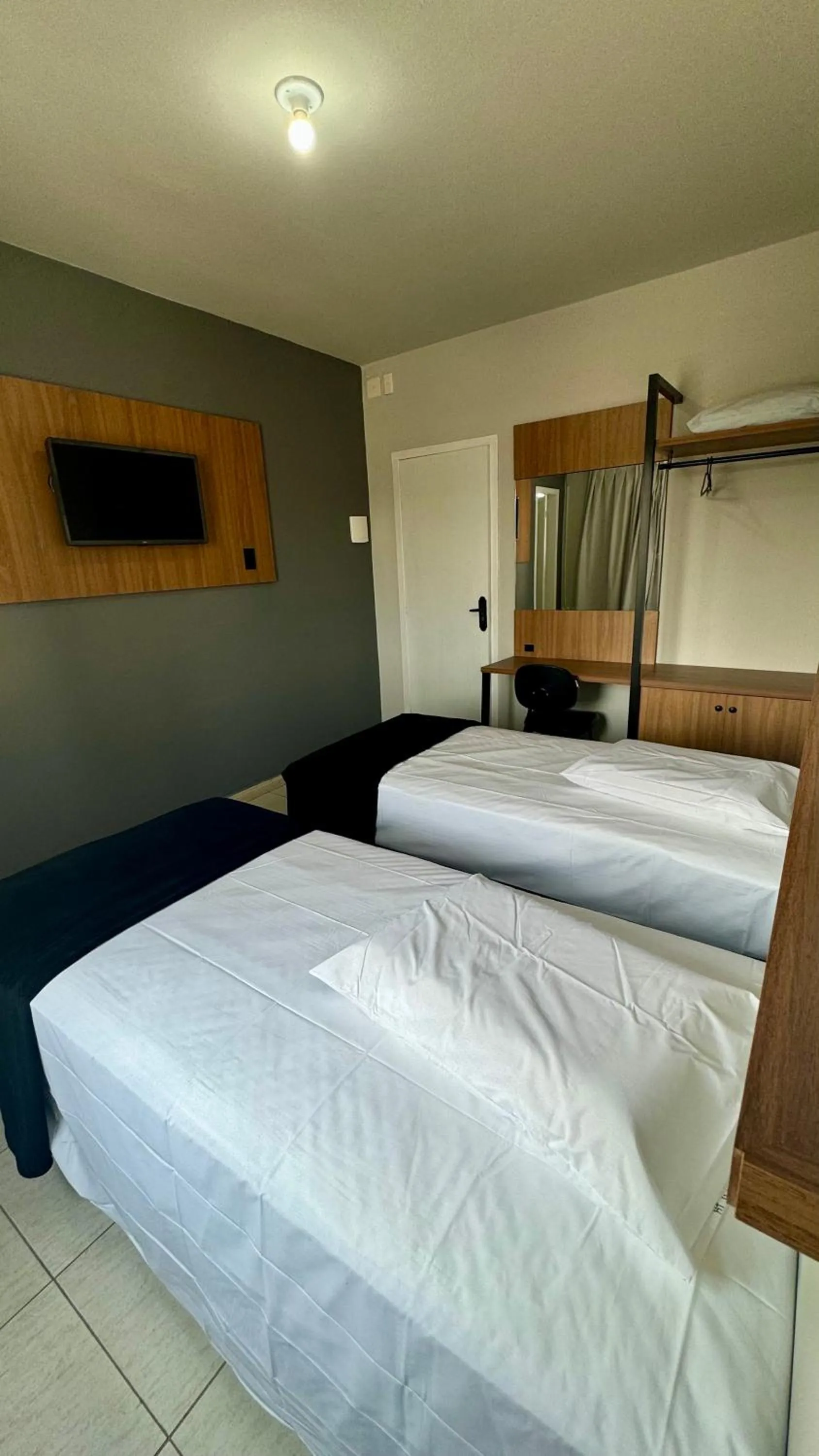 Bed in Hotel Tubarao