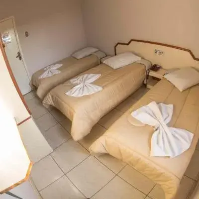 Triple Room in Hotel Tubarao Triple Room in Hotel Tubarao