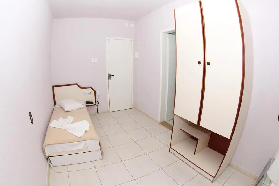 Bed in Hotel Tubarao