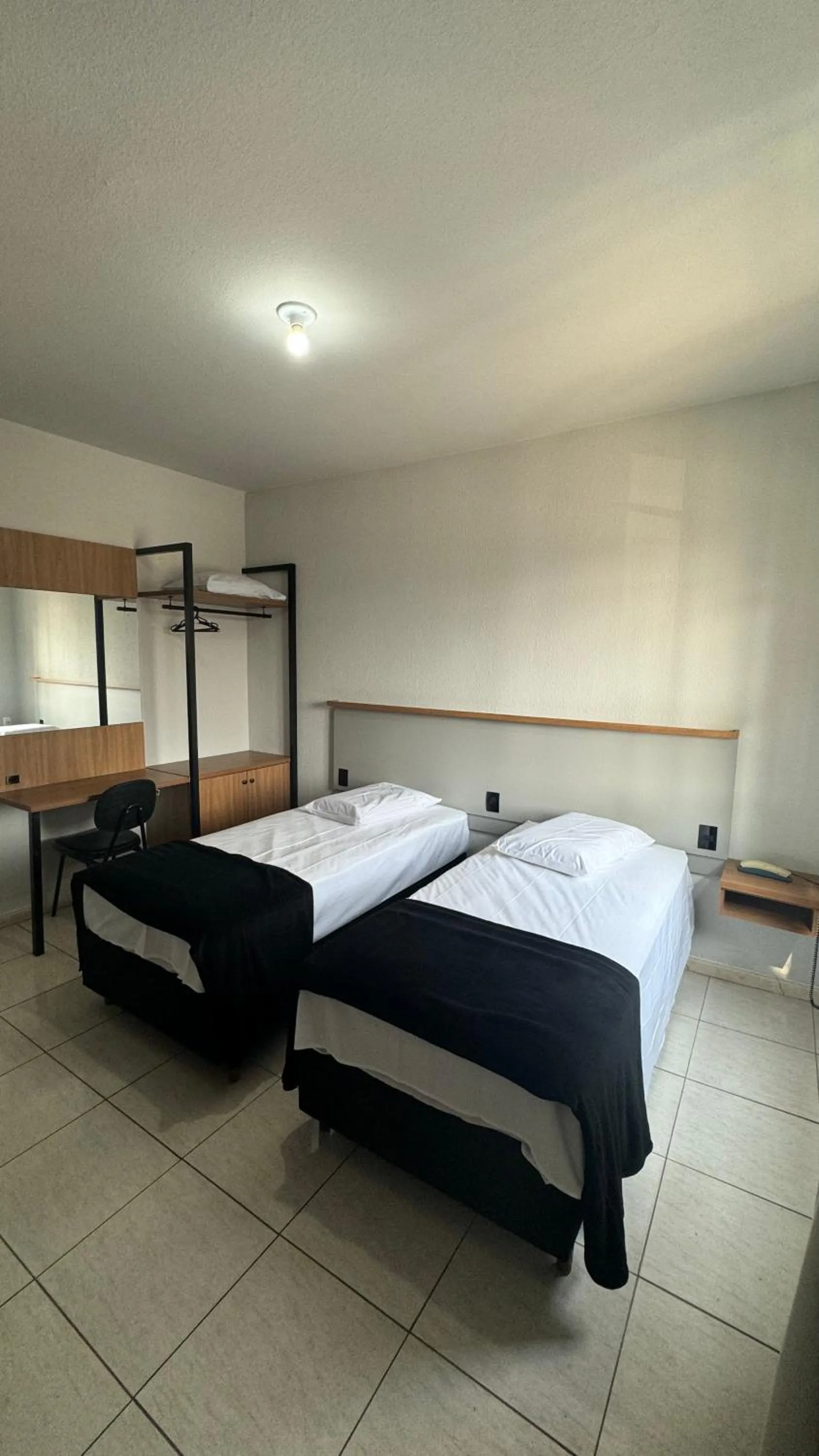 Bed in Hotel Tubarao