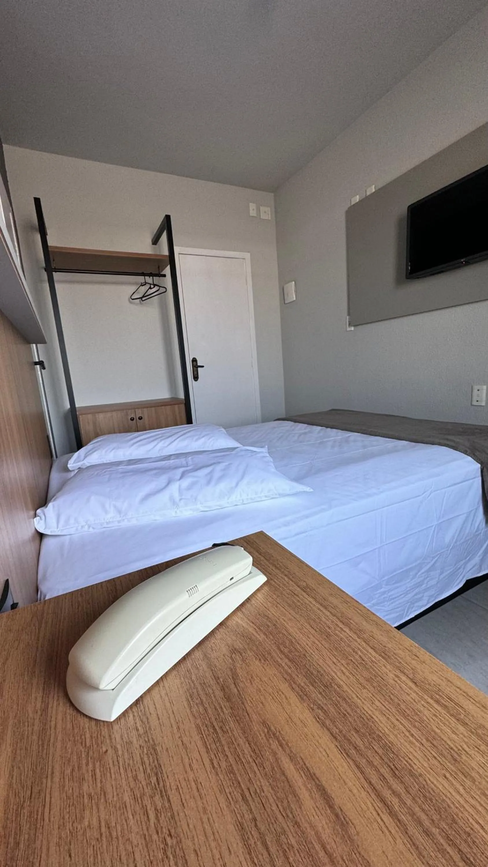 Bed in Hotel Tubarao