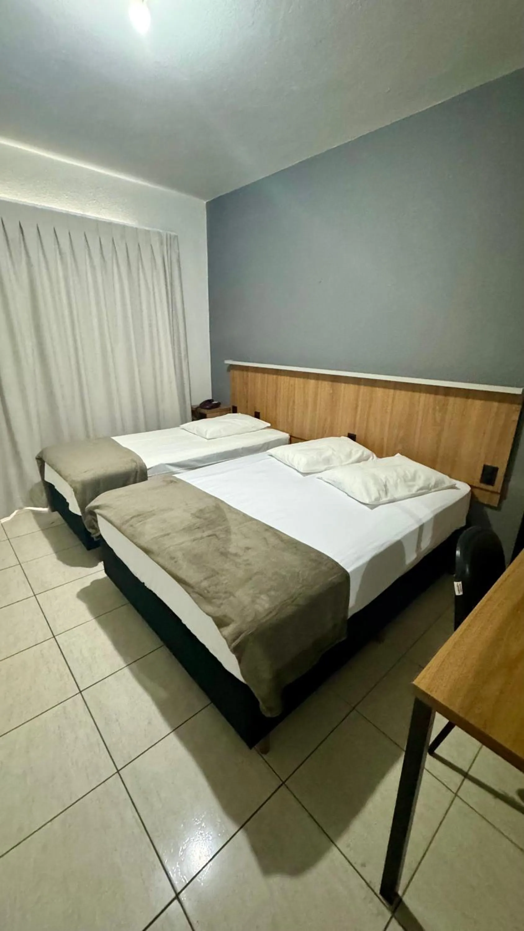 Bed in Hotel Tubarao