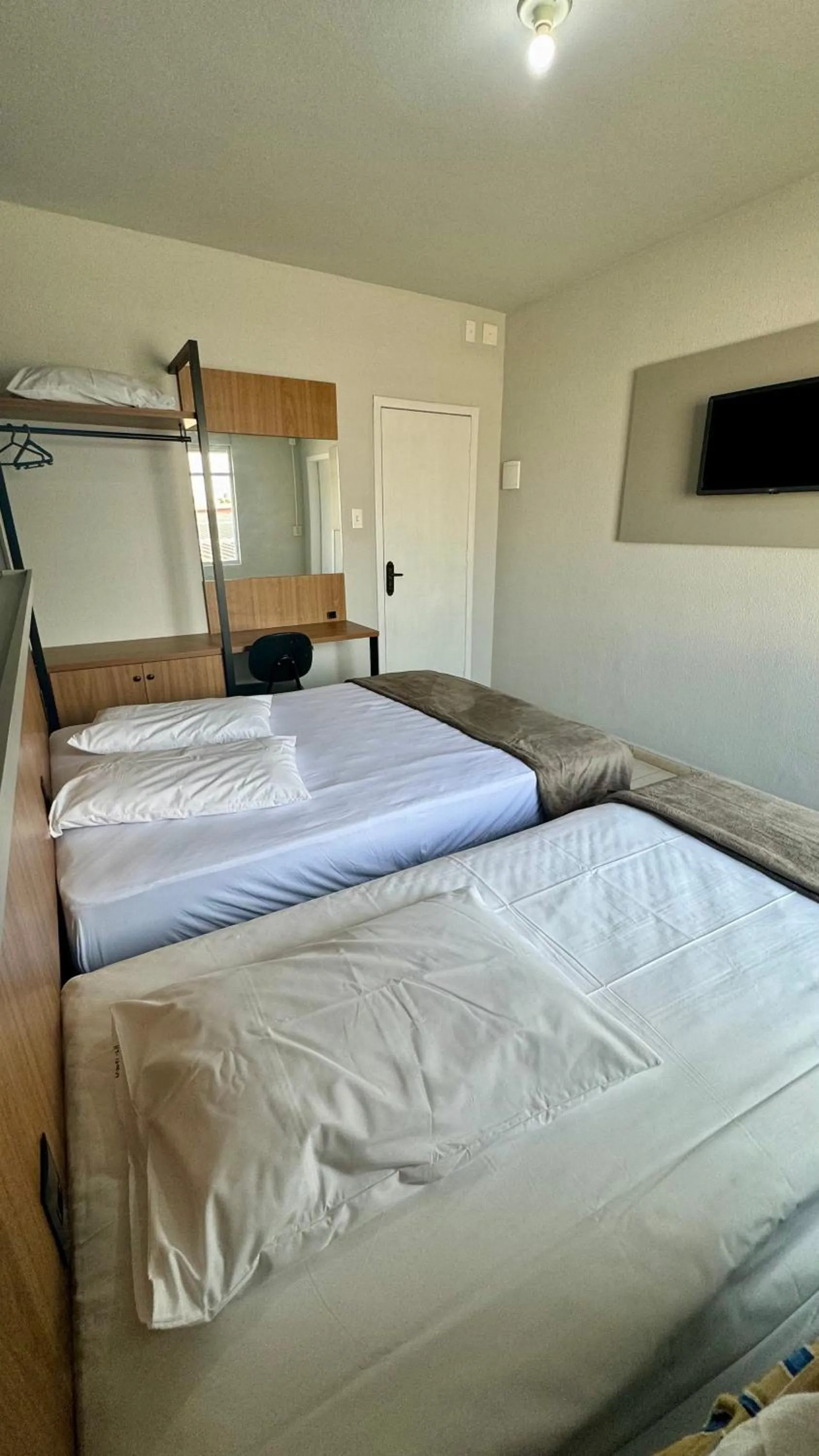 Bed in Hotel Tubarao