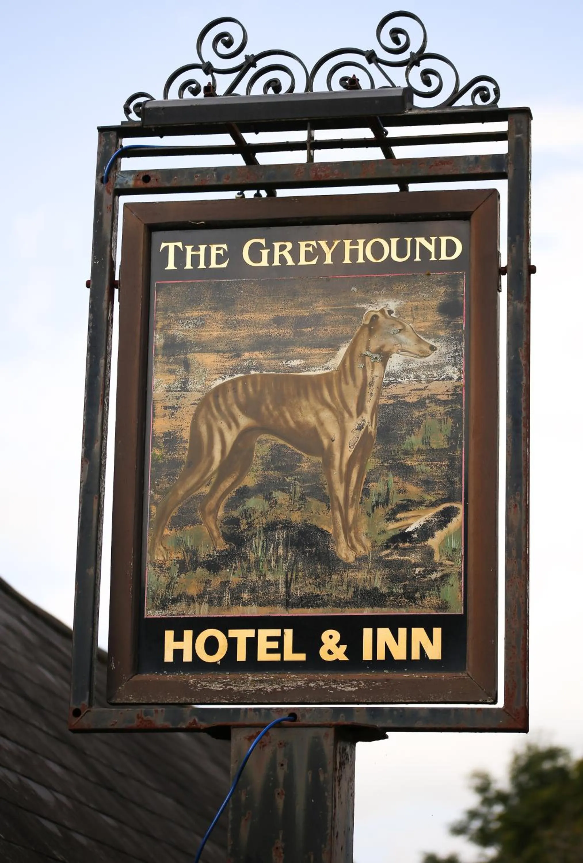 Property logo or sign in The Greyhound Inn and Hotel