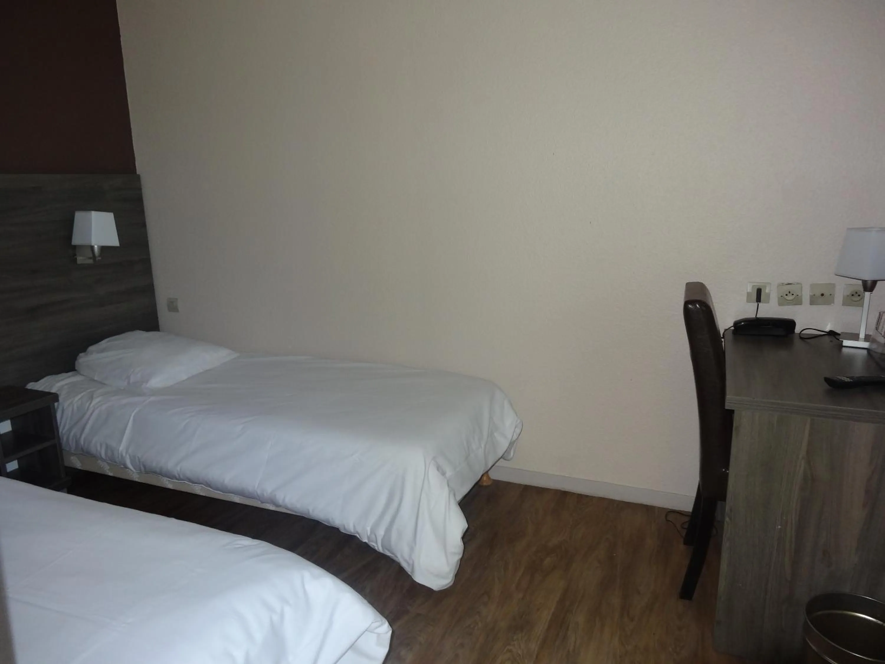 Bed in Logis Hotel des Portes de Meuse