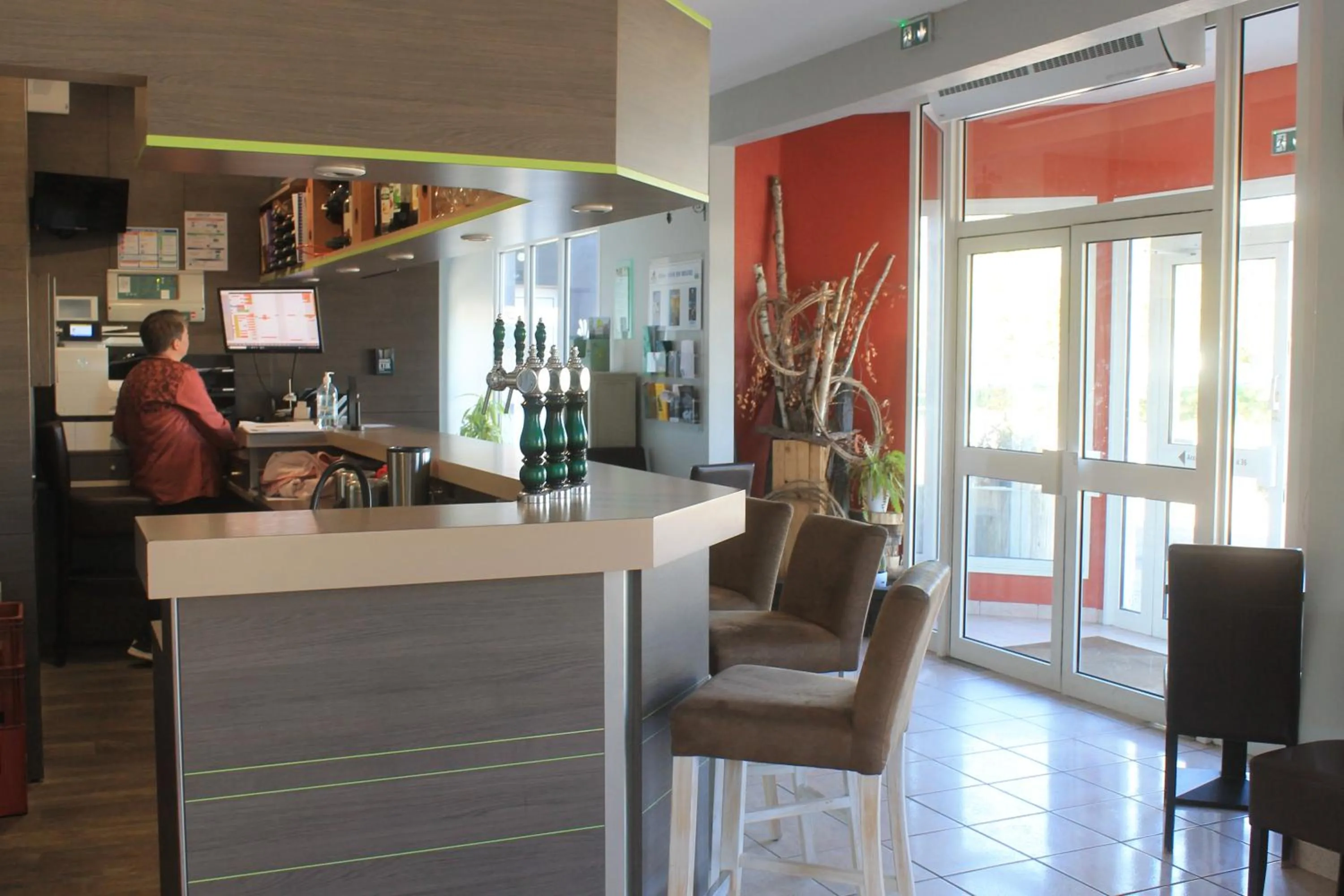 Lobby or reception in Logis Hotel des Portes de Meuse