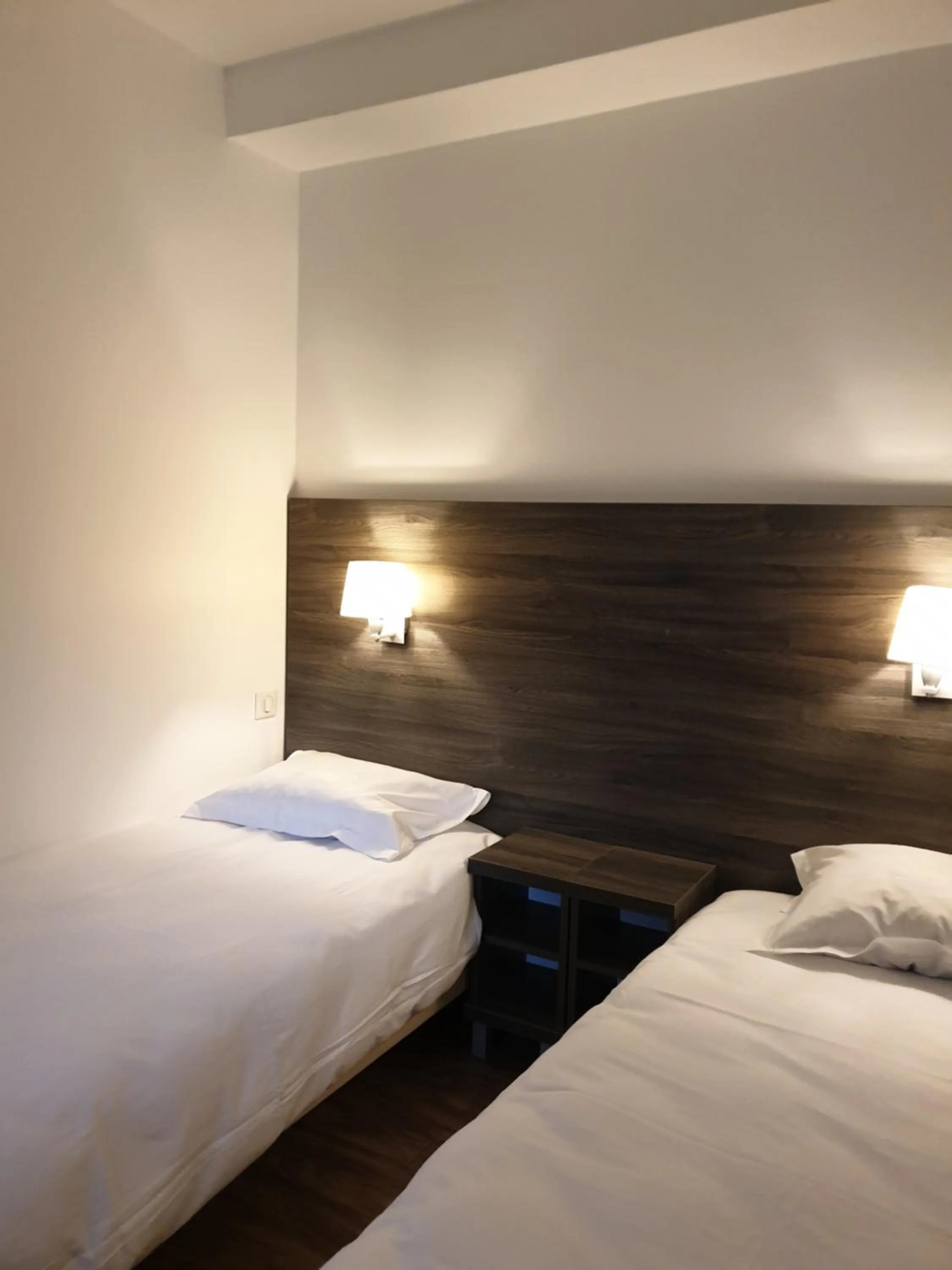 Bed in Logis Hotel des Portes de Meuse