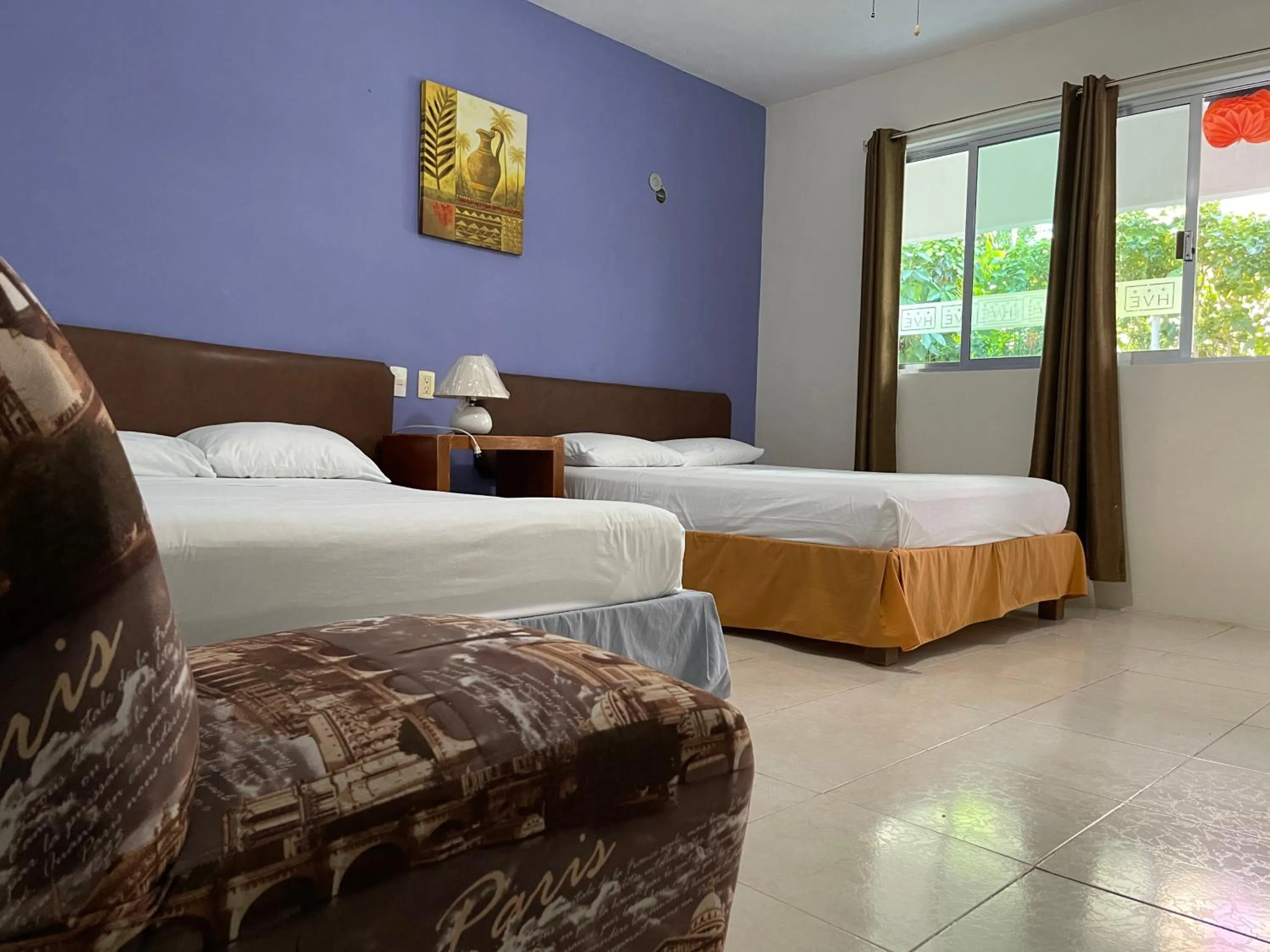 Bed in Hotel Villa Escondida Campeche