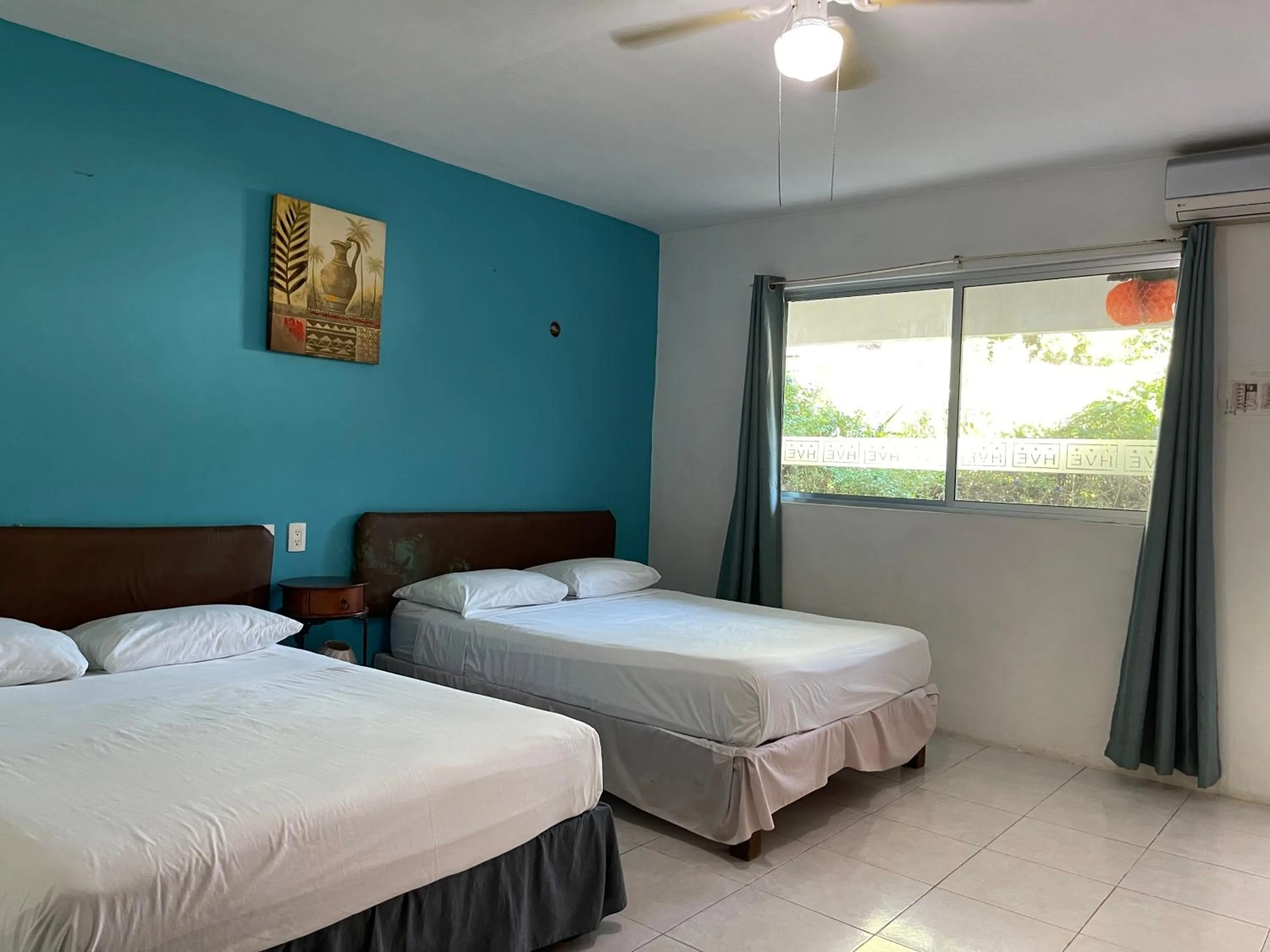 Bed in Hotel Villa Escondida Campeche