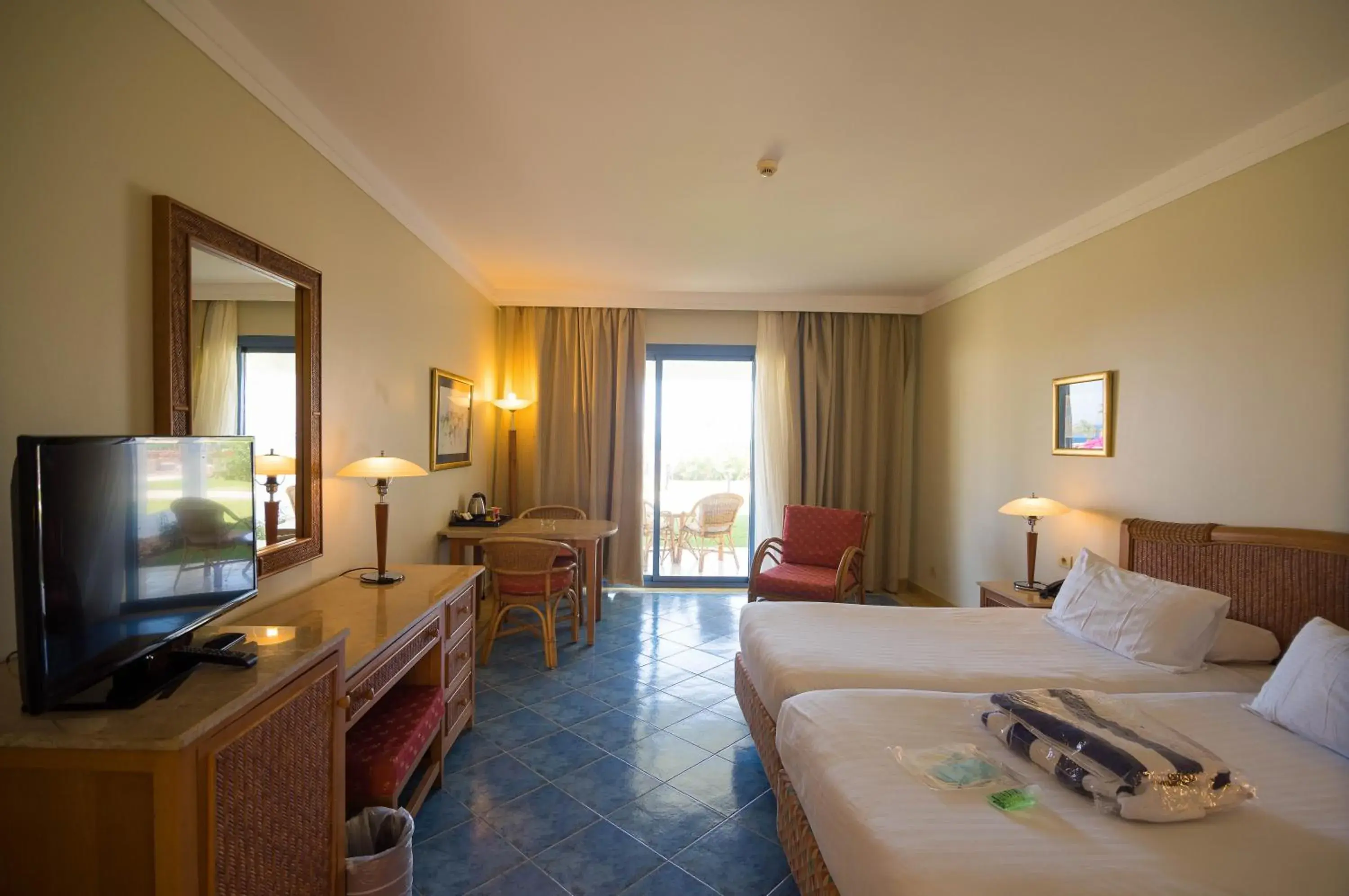 Seating area, Bed in Ecotel Dahab Bay View Resort Seating area, Bed in Ecotel Dahab Bay View Resort