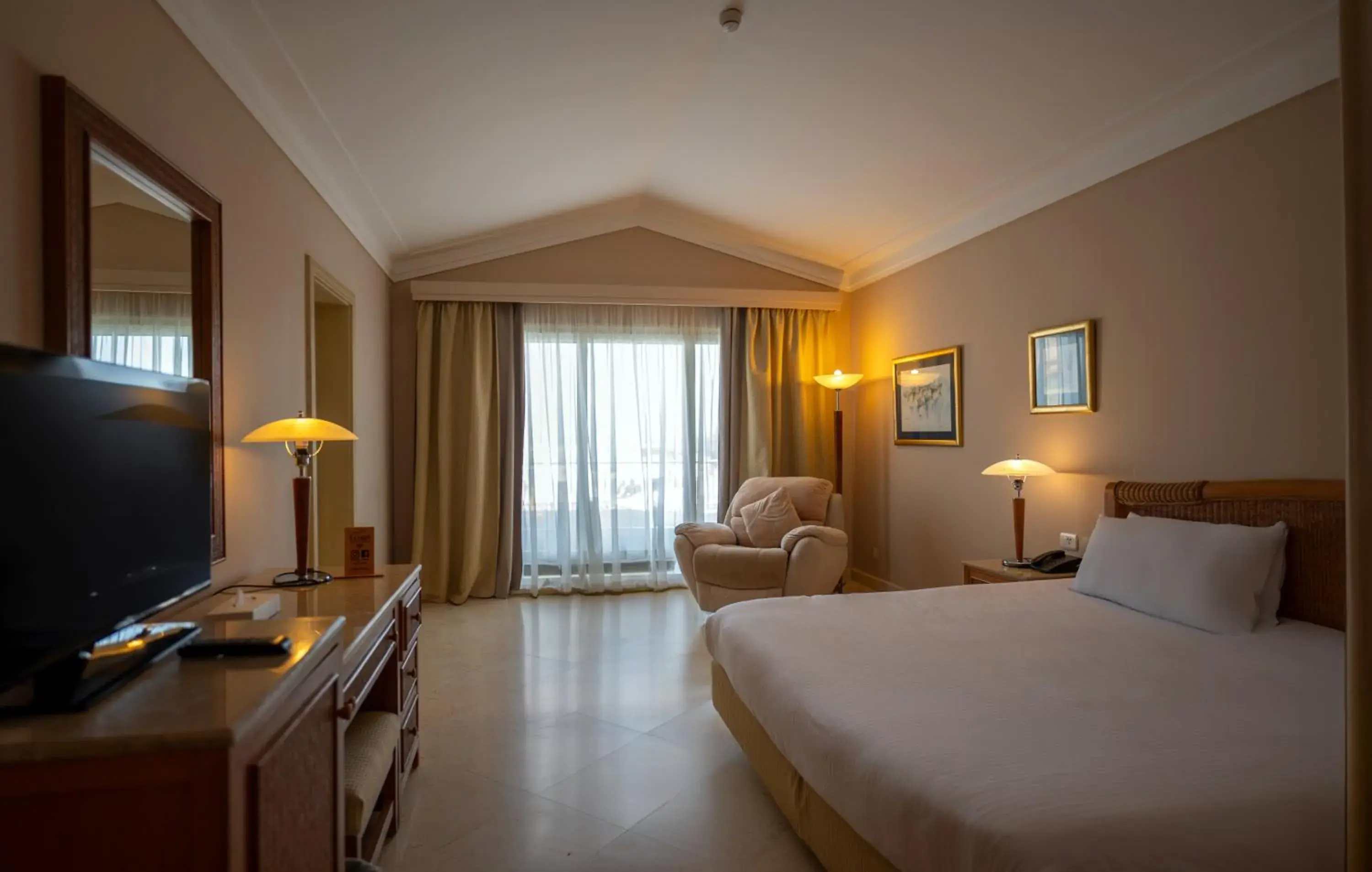 TV and multimedia, Bed in Ecotel Dahab Bay View Resort TV and multimedia, Bed in Ecotel Dahab Bay View Resort