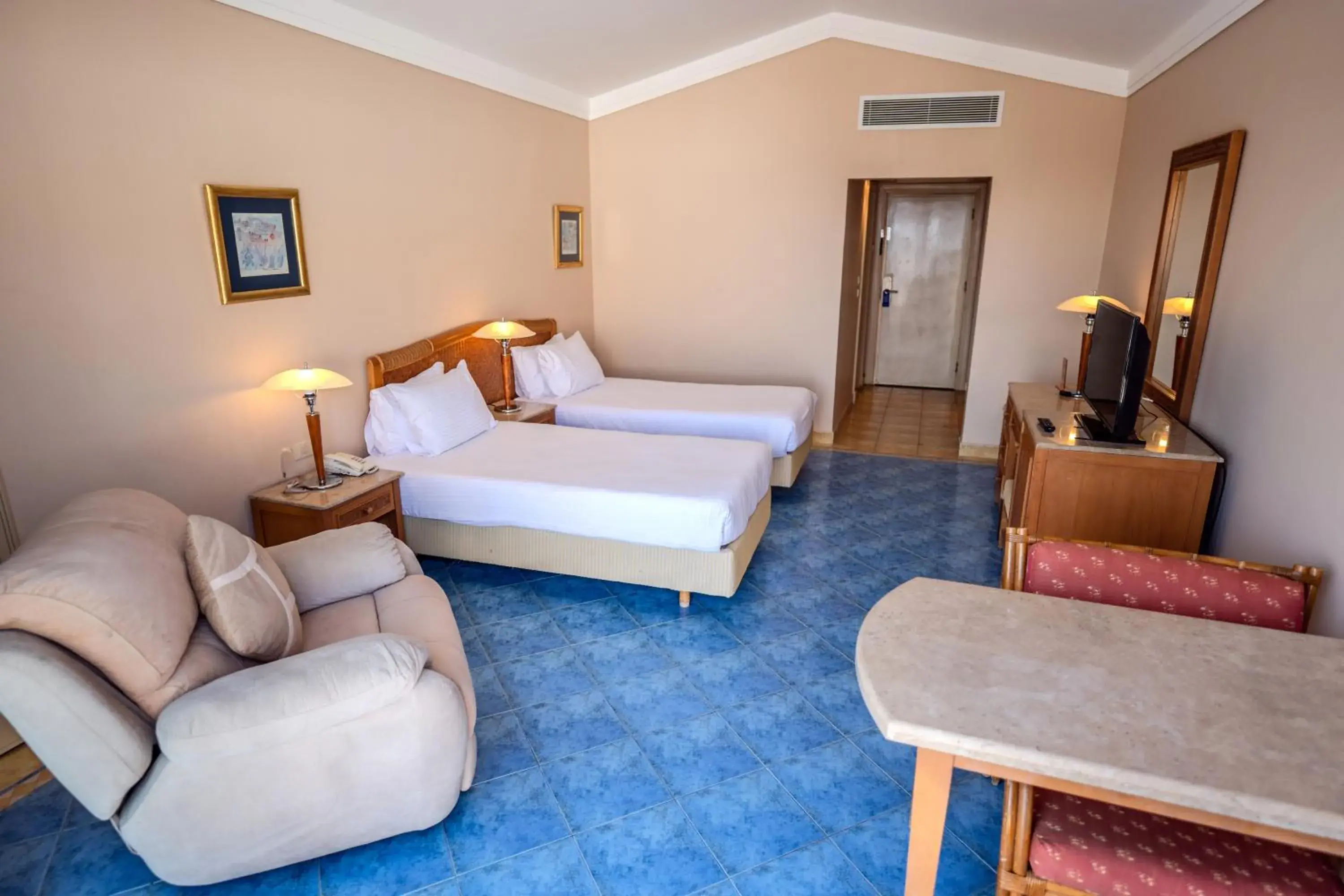 Seating area, Bed in Ecotel Dahab Bay View Resort Seating area, Bed in Ecotel Dahab Bay View Resort