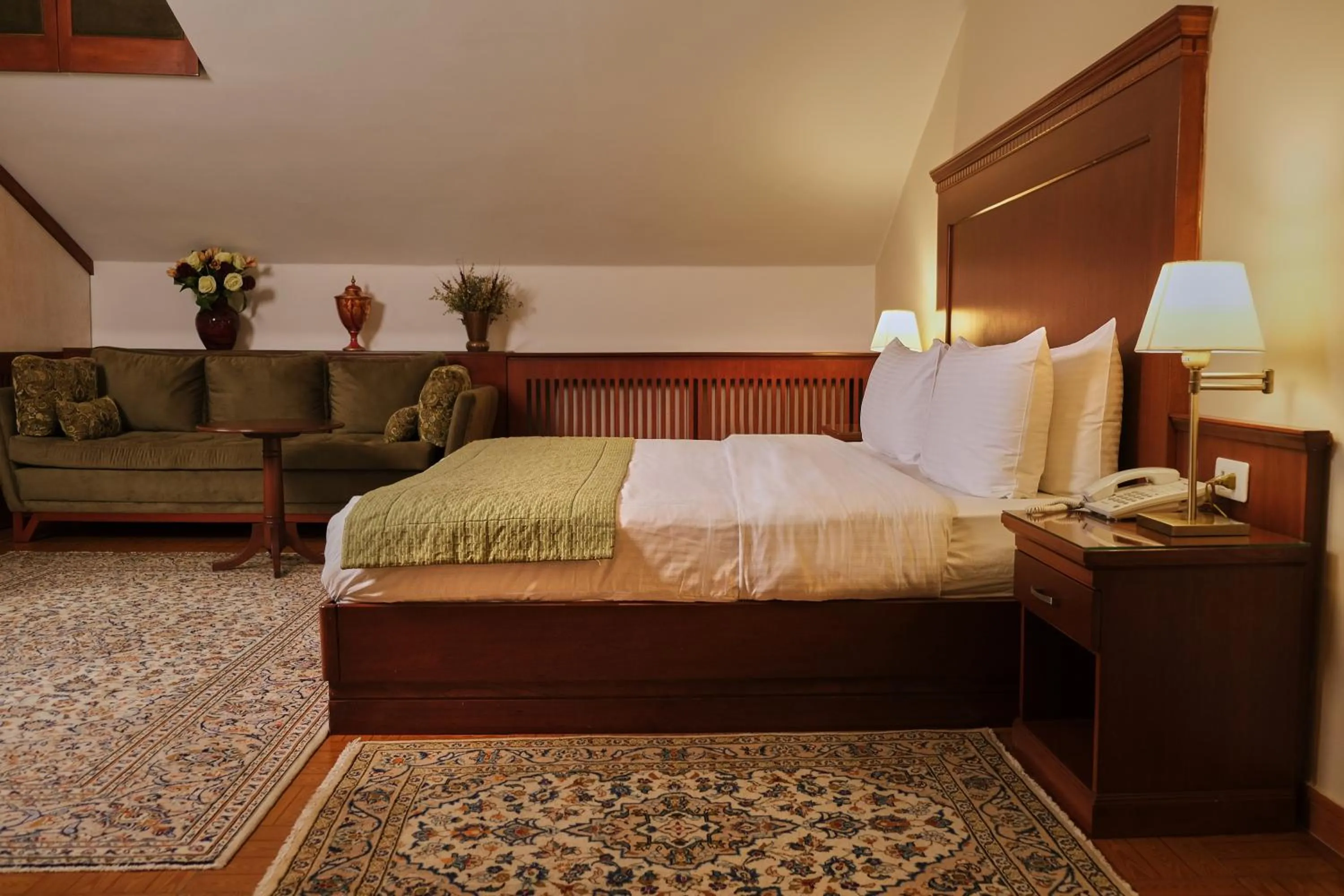 Living room, Bed in Le Cedrus Hotel