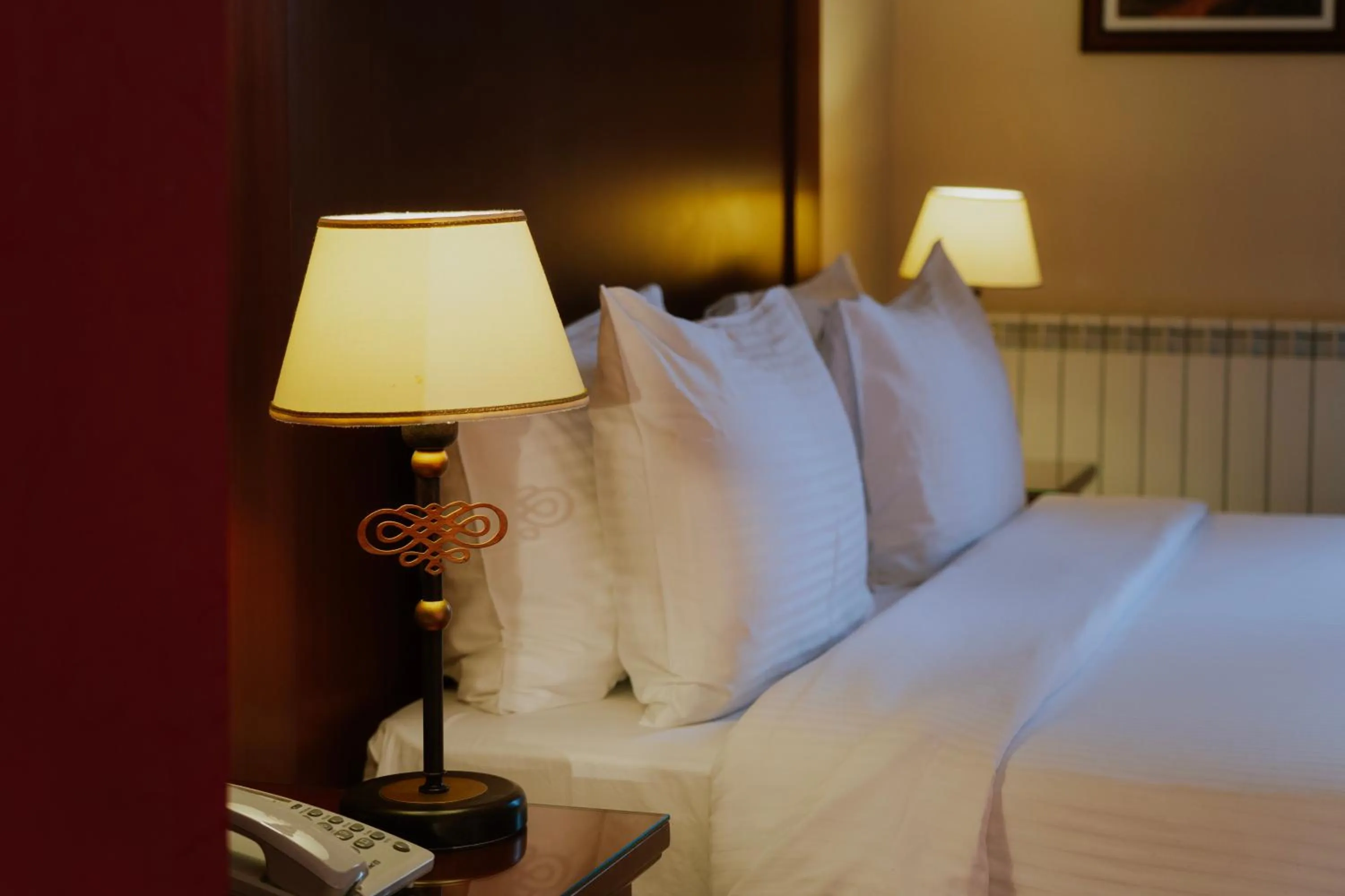 Bed in Le Cedrus Hotel