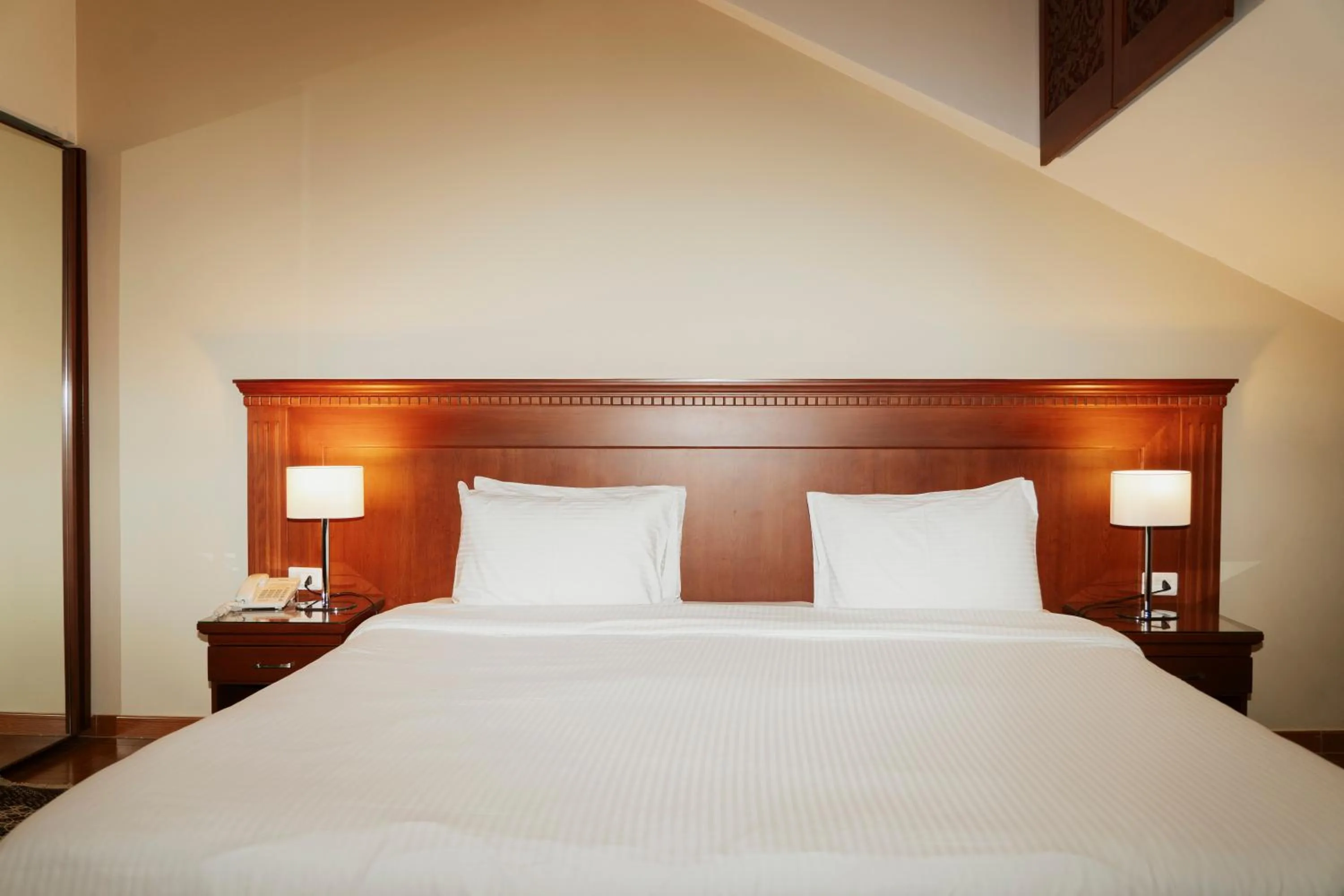 Bed in Le Cedrus Hotel