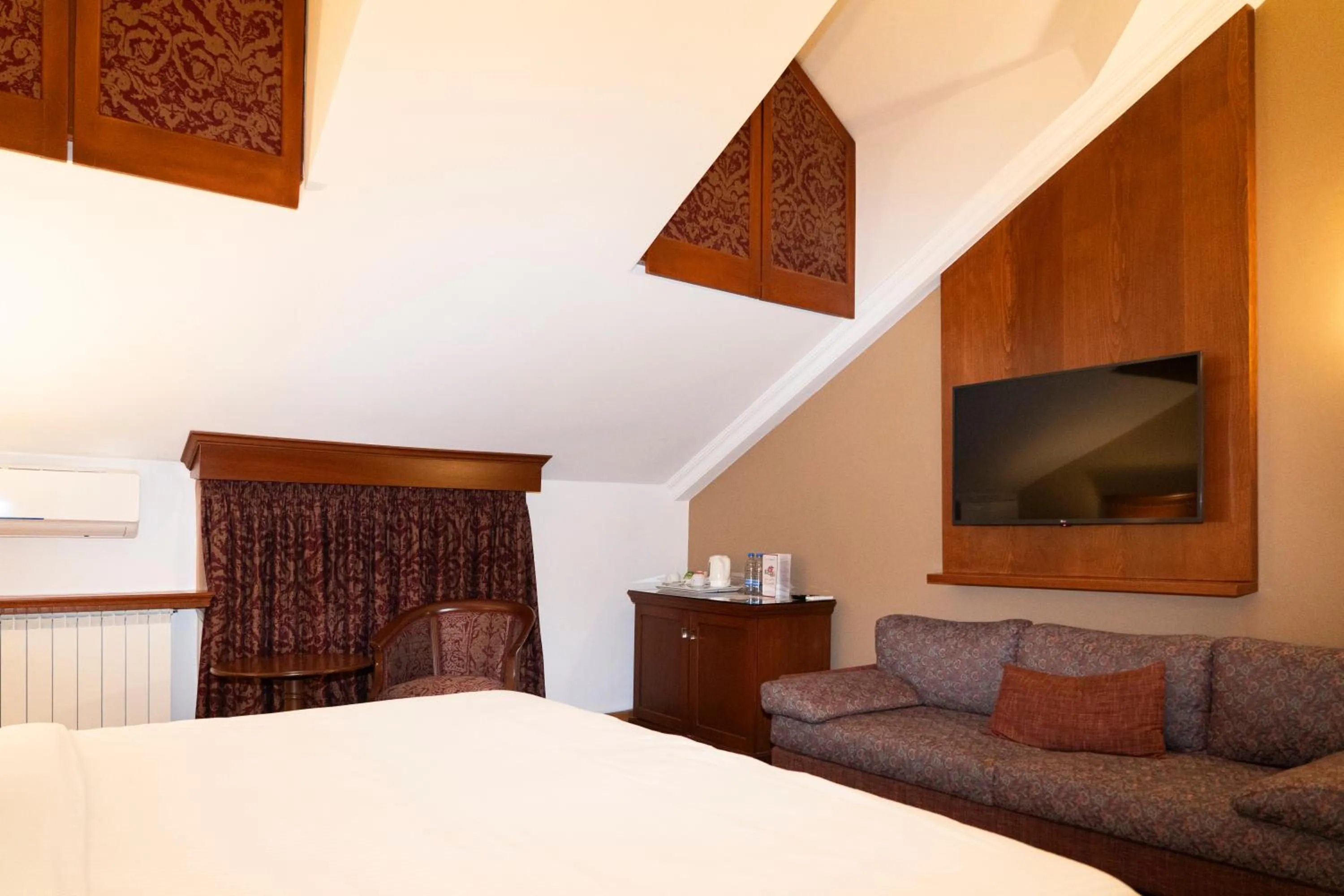 Bed in Le Cedrus Hotel