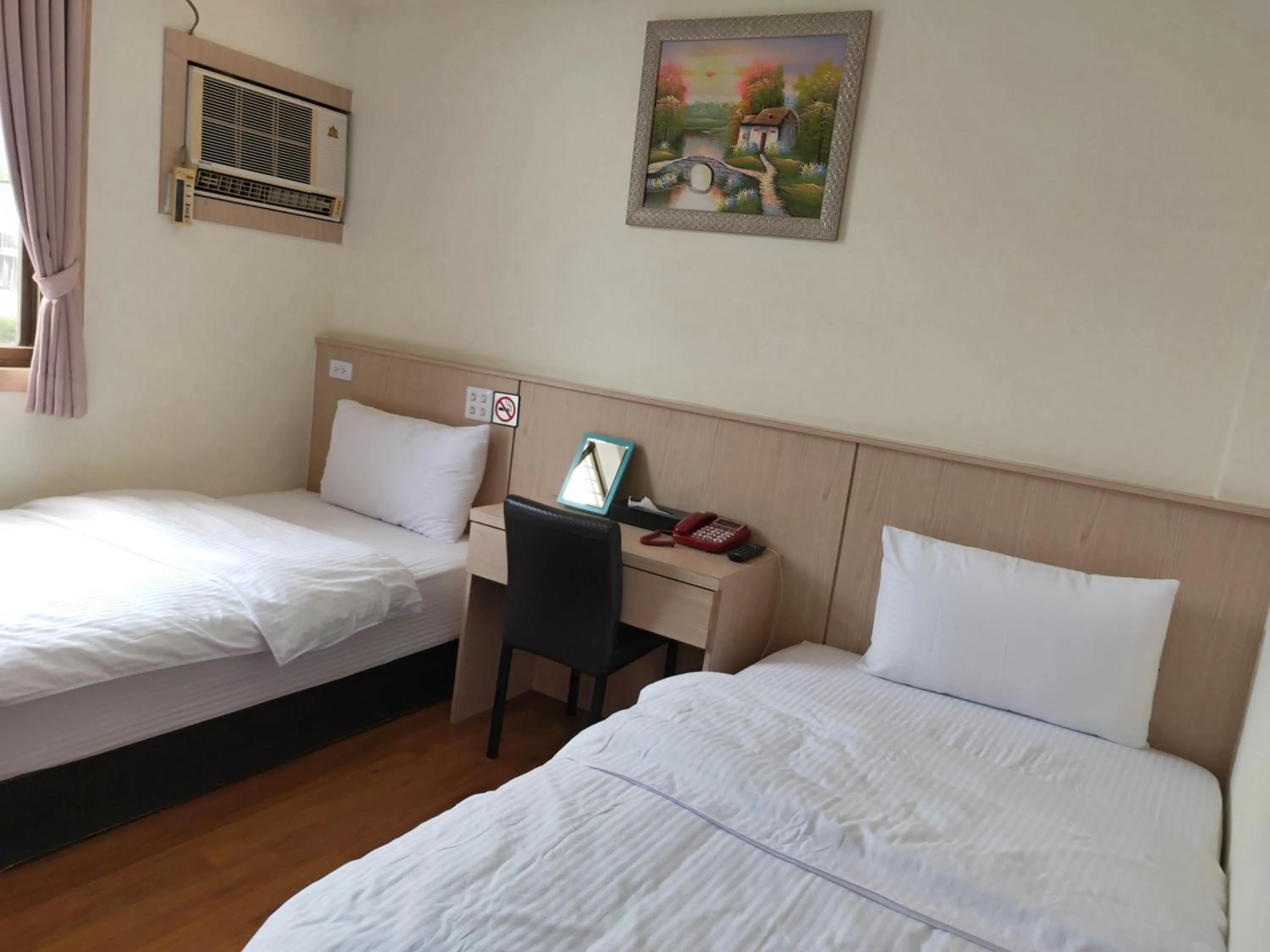 Bed in Oriental Hotel